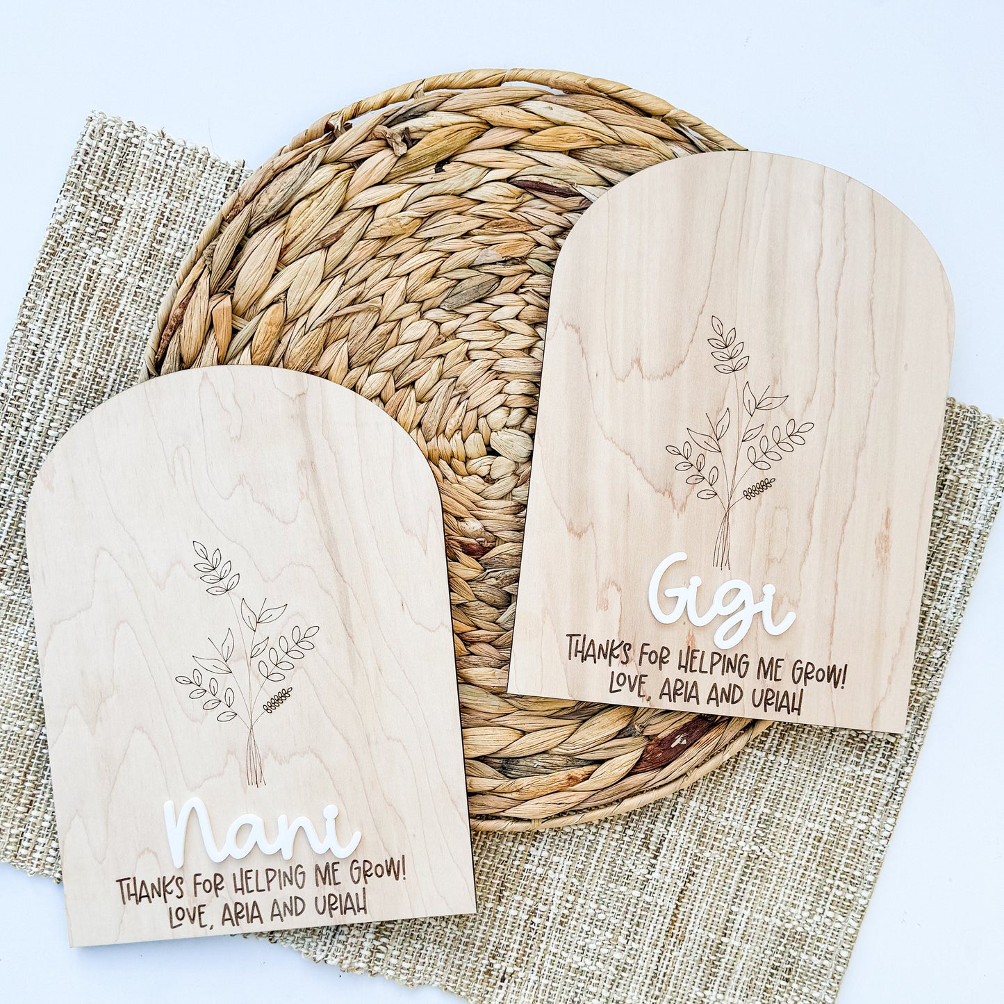 Close-up of personalized Grandma handprint flower sign with custom name and engraved detail