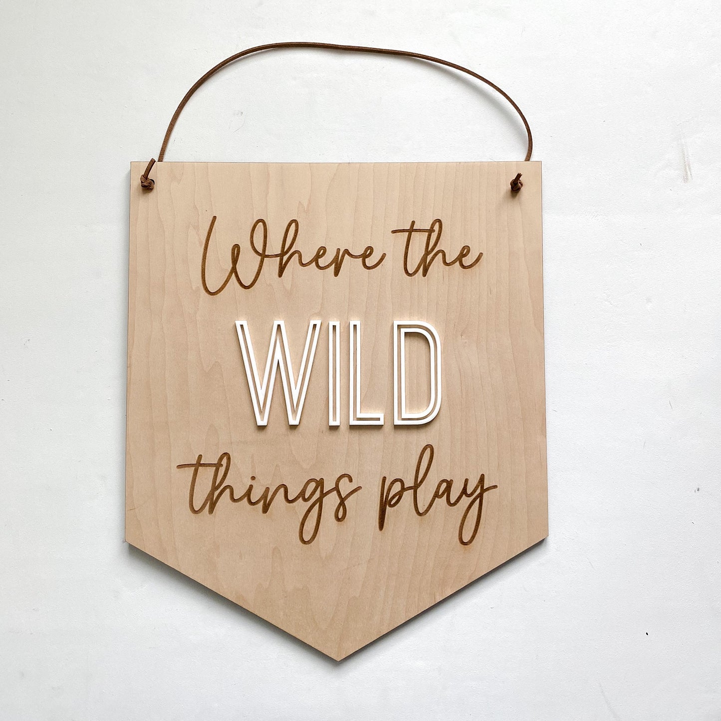 Where the Wild Things Play kids room wall sign styled with boho playroom decor