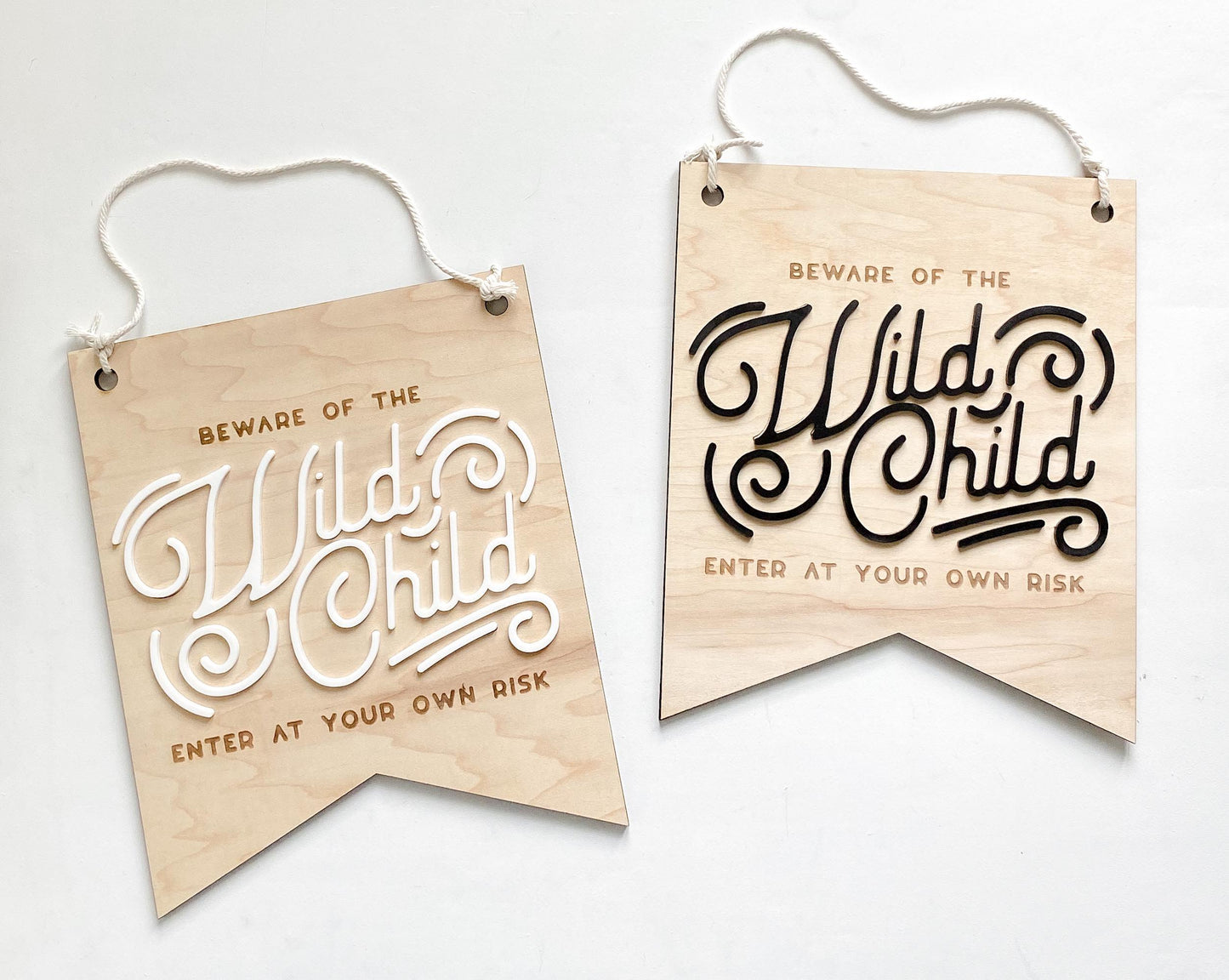 Beware of the Wild Child wooden sign showing engraved lettering, humorous kids decor