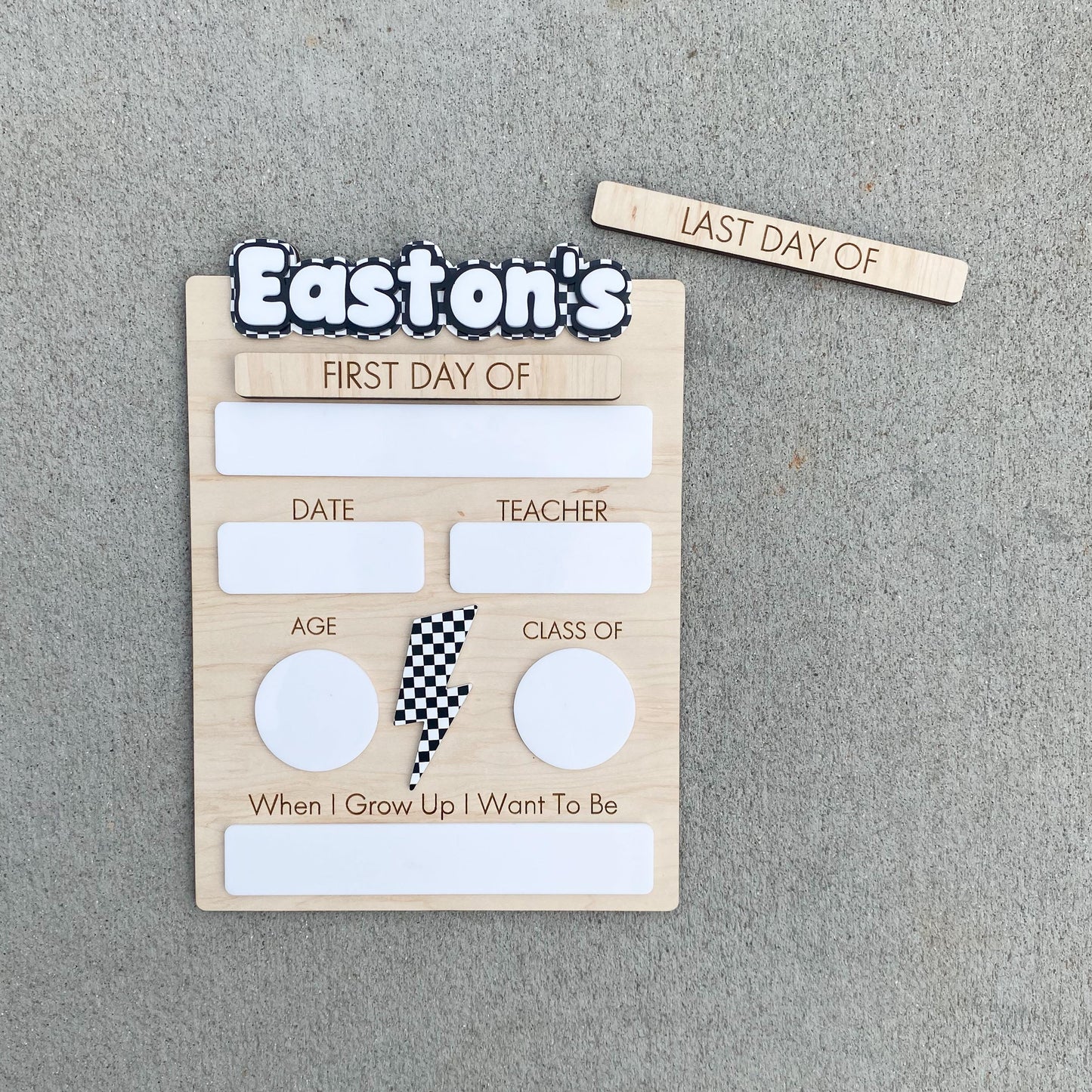 Lightning design first day of school sign showing custom name and dry-erase grade area