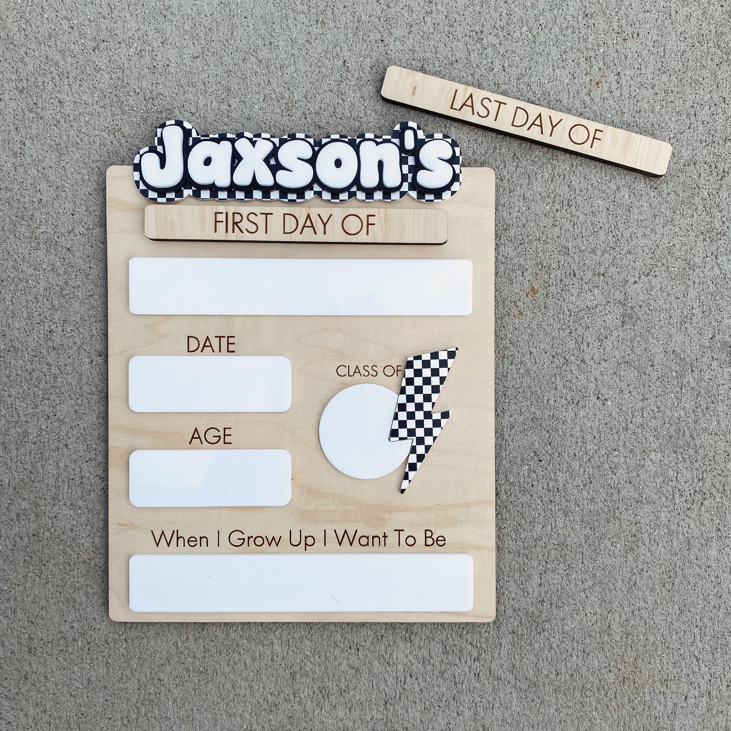 Checkerboard design first day of school sign with custom child's name