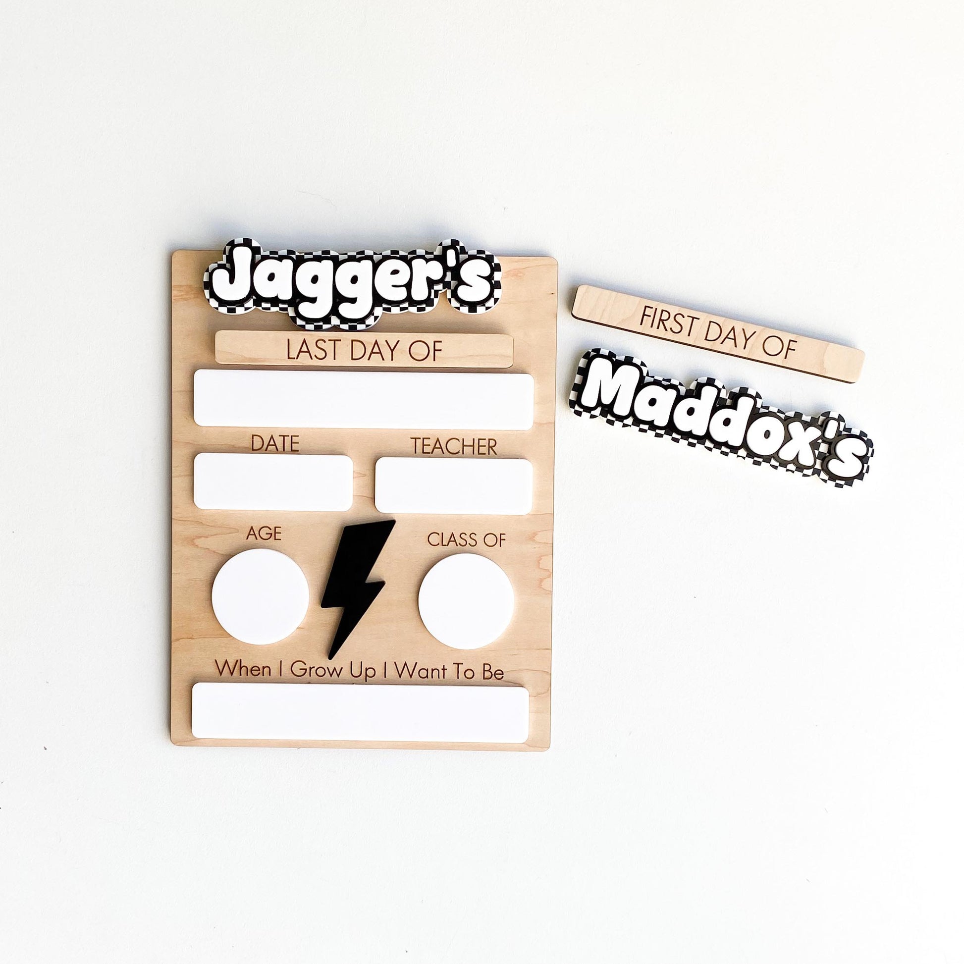 Personalized lightning first day of school sign showing dry-erase board and custom name