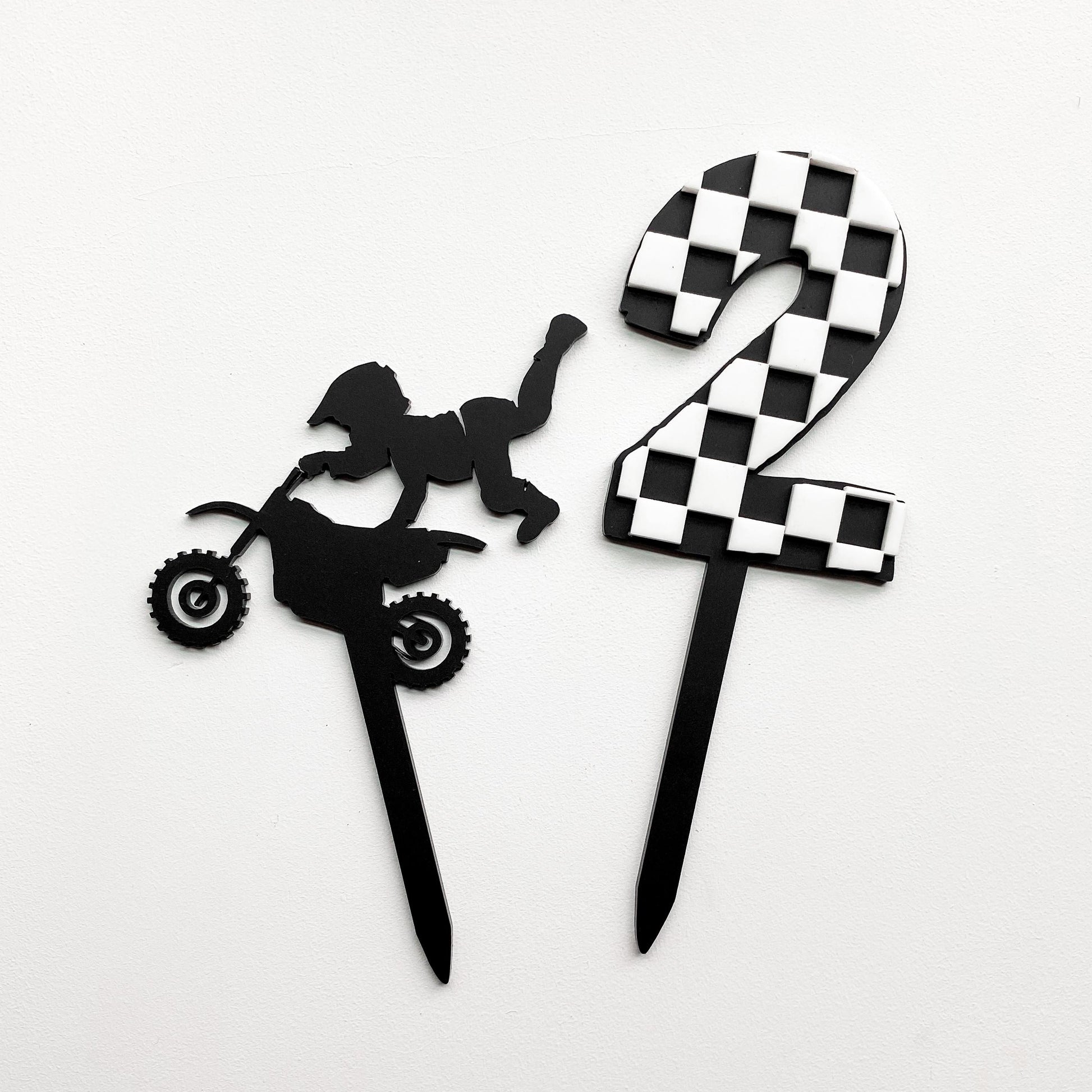 Checkered racing number cake topper displayed on birthday cake, custom age available