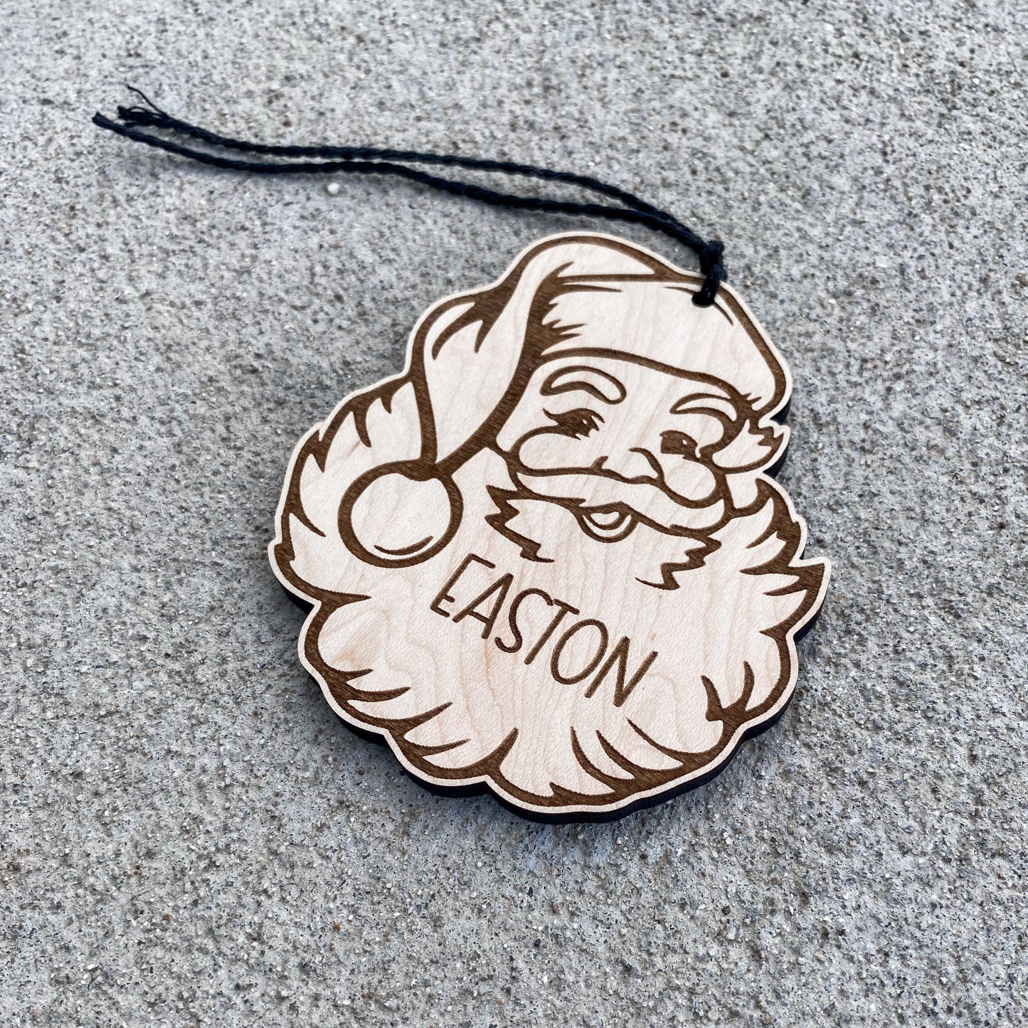 Personalized Christmas stocking name tag in maple wood with classic Santa design