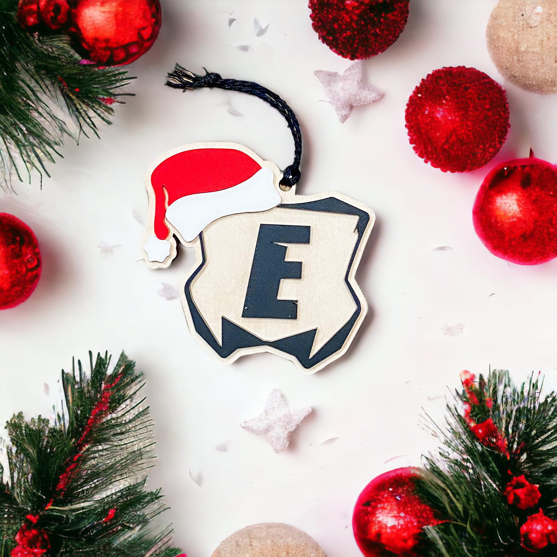 Close-up of dirt bike number plate Christmas ornament with personalized name