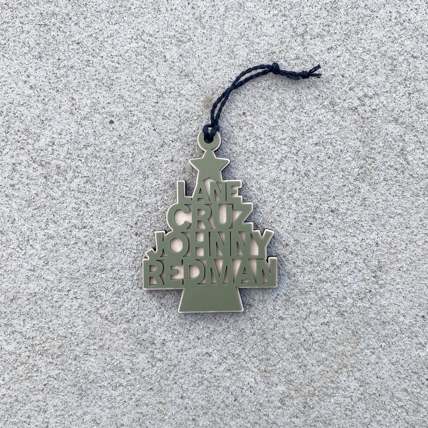 Personalized maple wood Christmas ornament with engraved name, holiday keepsake