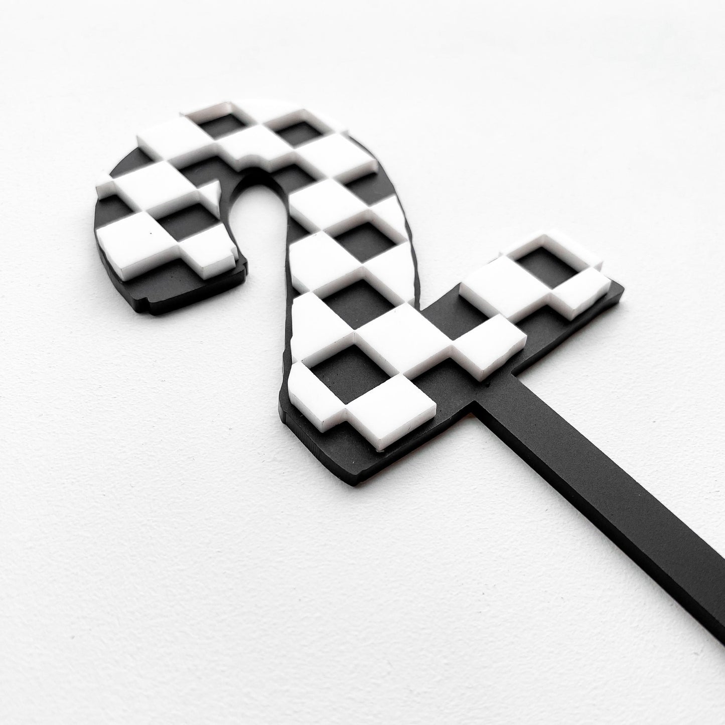 Personalized checkered number cake topper showing checker flag design and color options