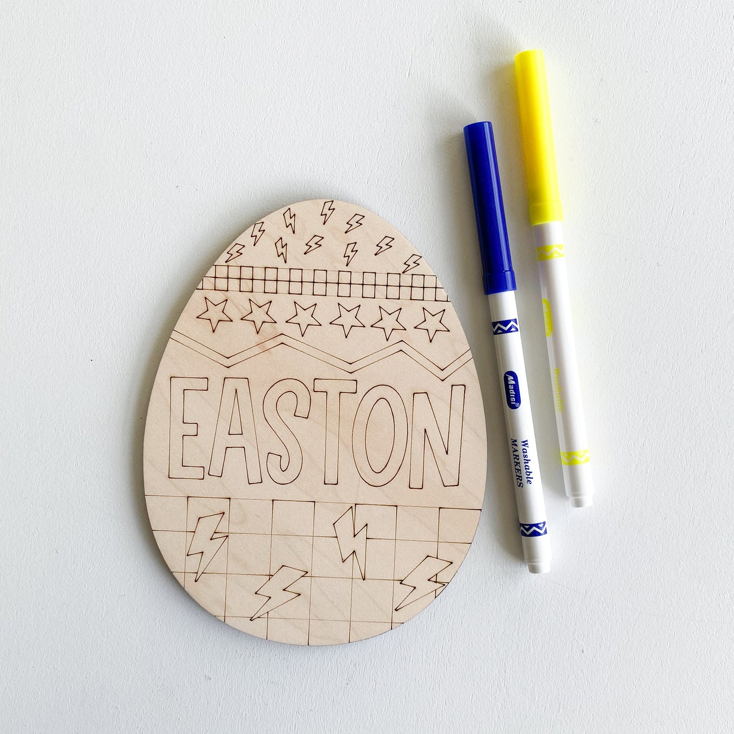 DIY Easter egg coloring activity for kids with wooden egg and markers