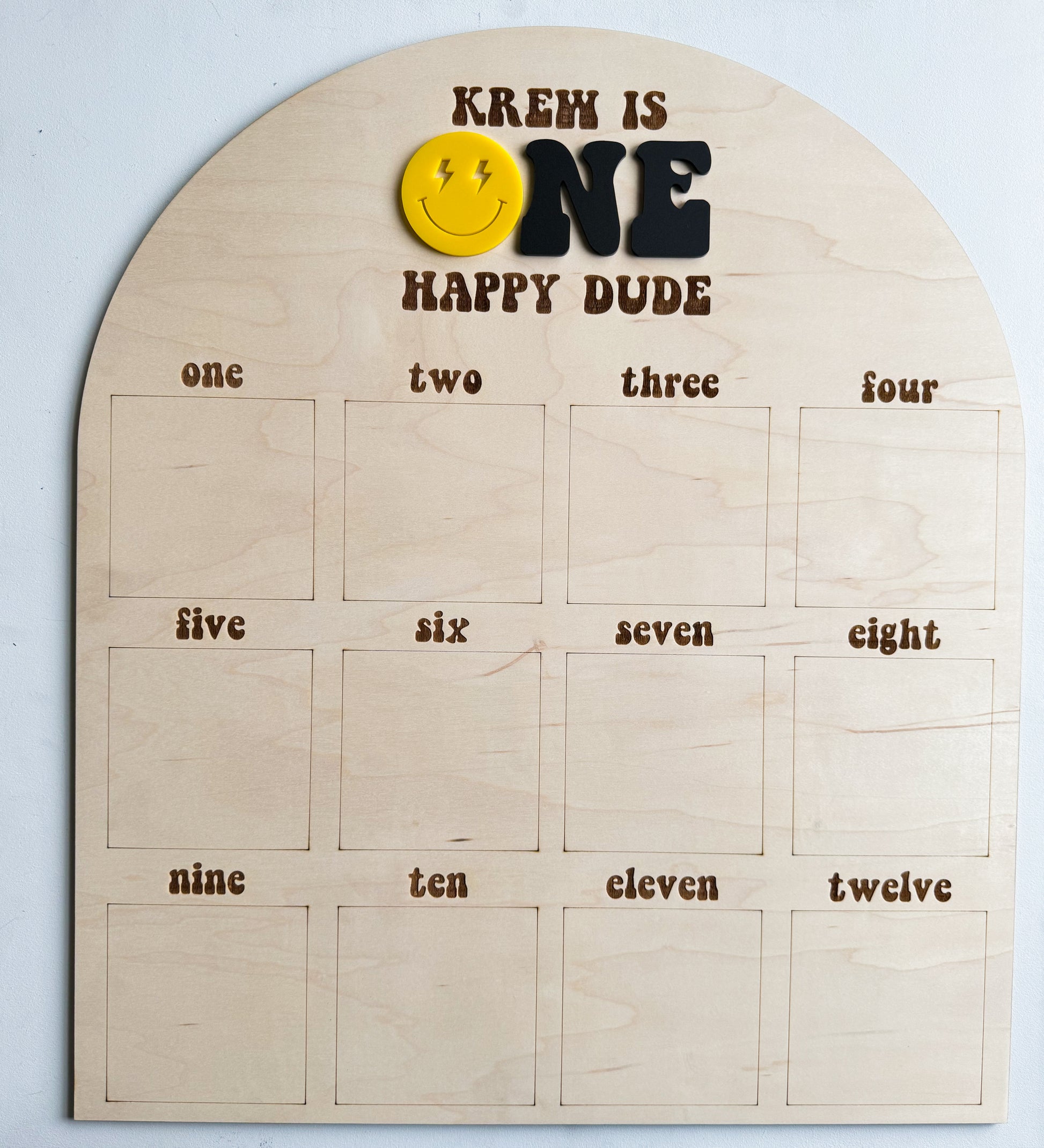 Personalized One Happy Dude first birthday photo board showing monthly photo slots