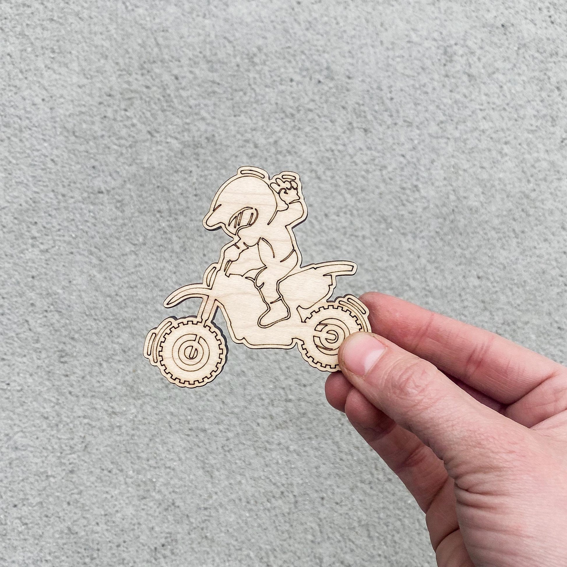 Dirt bike coloring sheet party favor displayed with marker and packaging