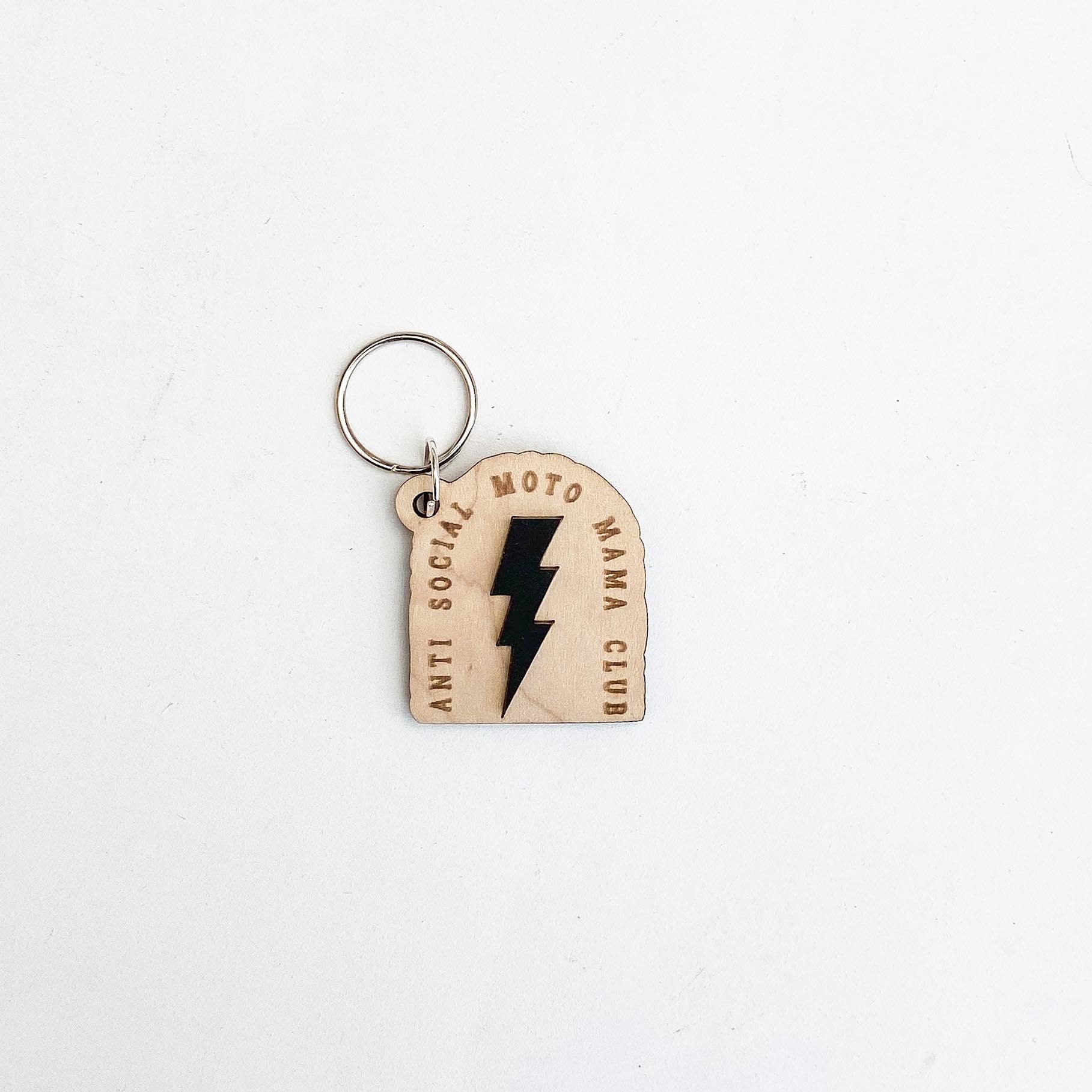 Anti Social Moto Mama Club keychain in maple wood with lightning bolt acrylic accent
