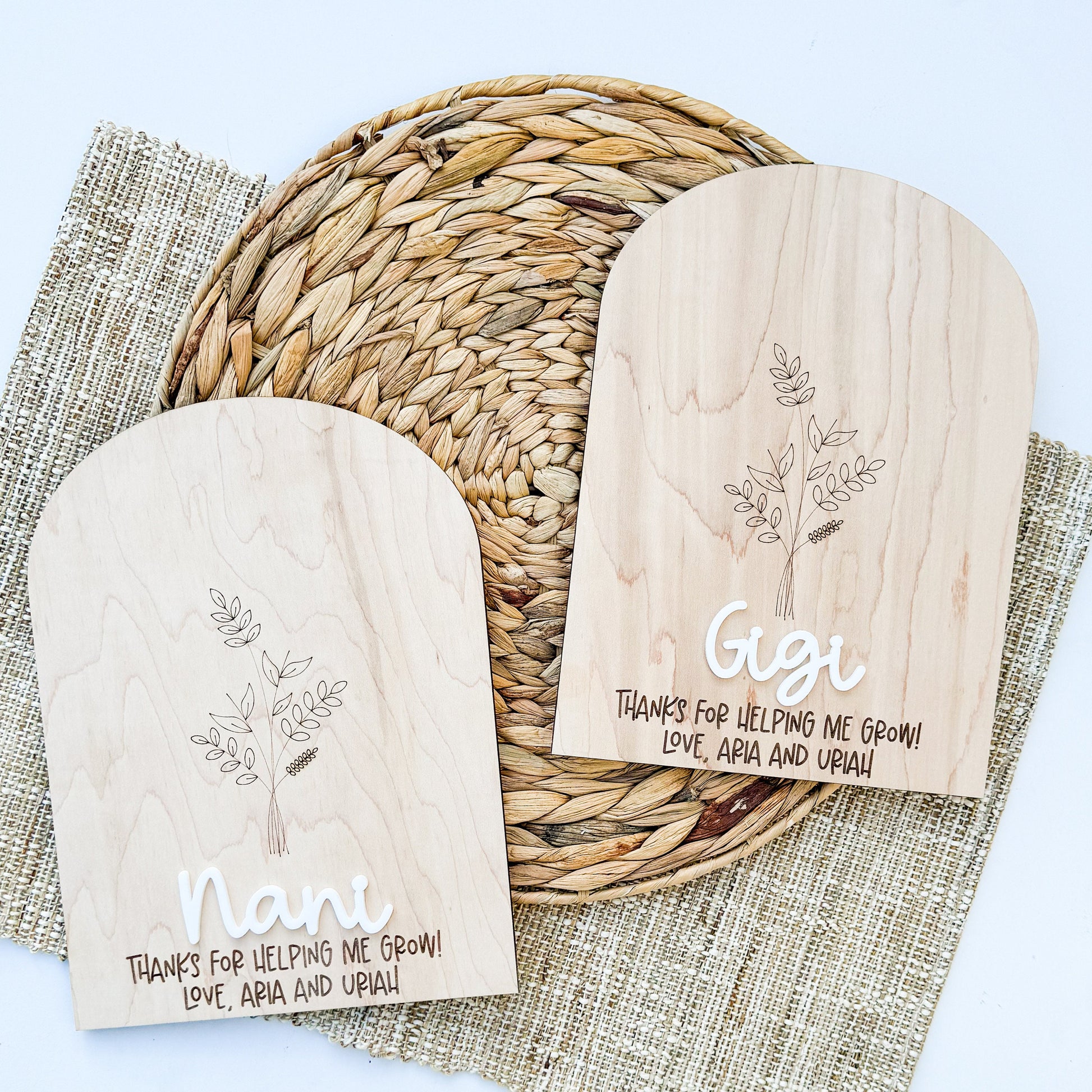 Close-up of personalized Grandma handprint flower sign with custom name and engraved detail