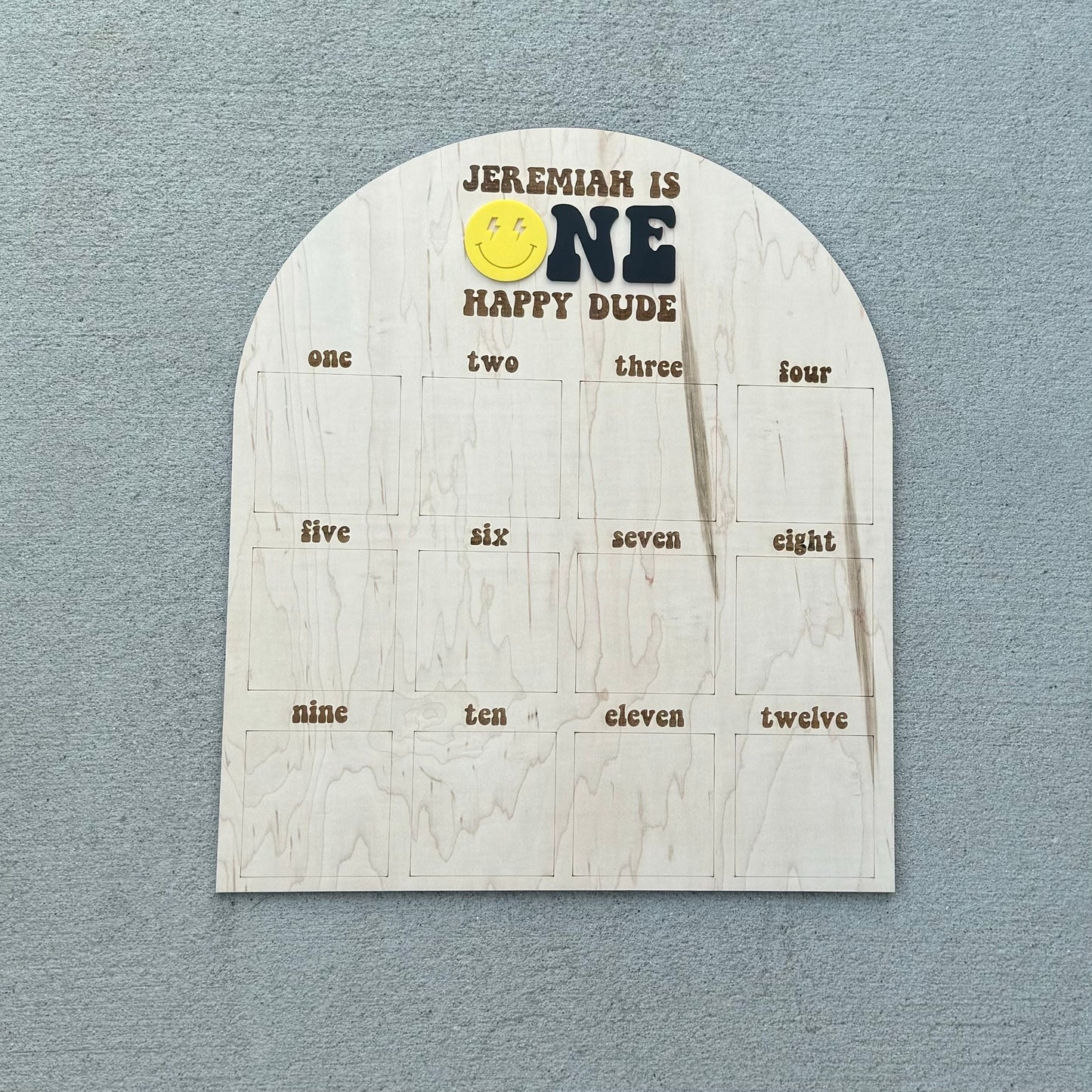 Close-up of One Rad Dude first year photo board with personalized name detail