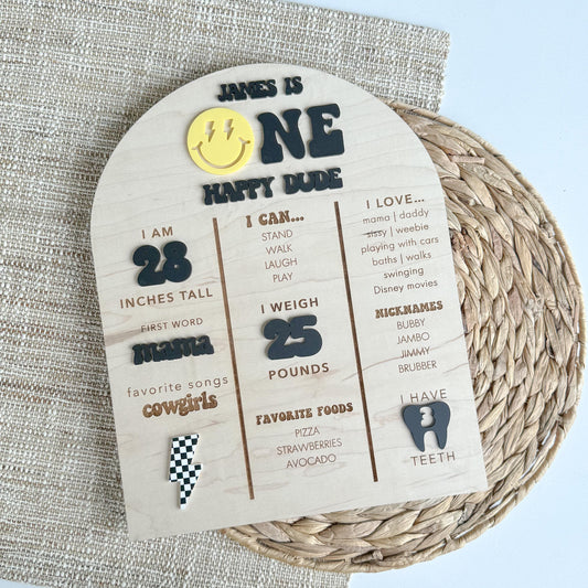 One Happy Dude first birthday milestone stat board in maple wood with personalized baby stats