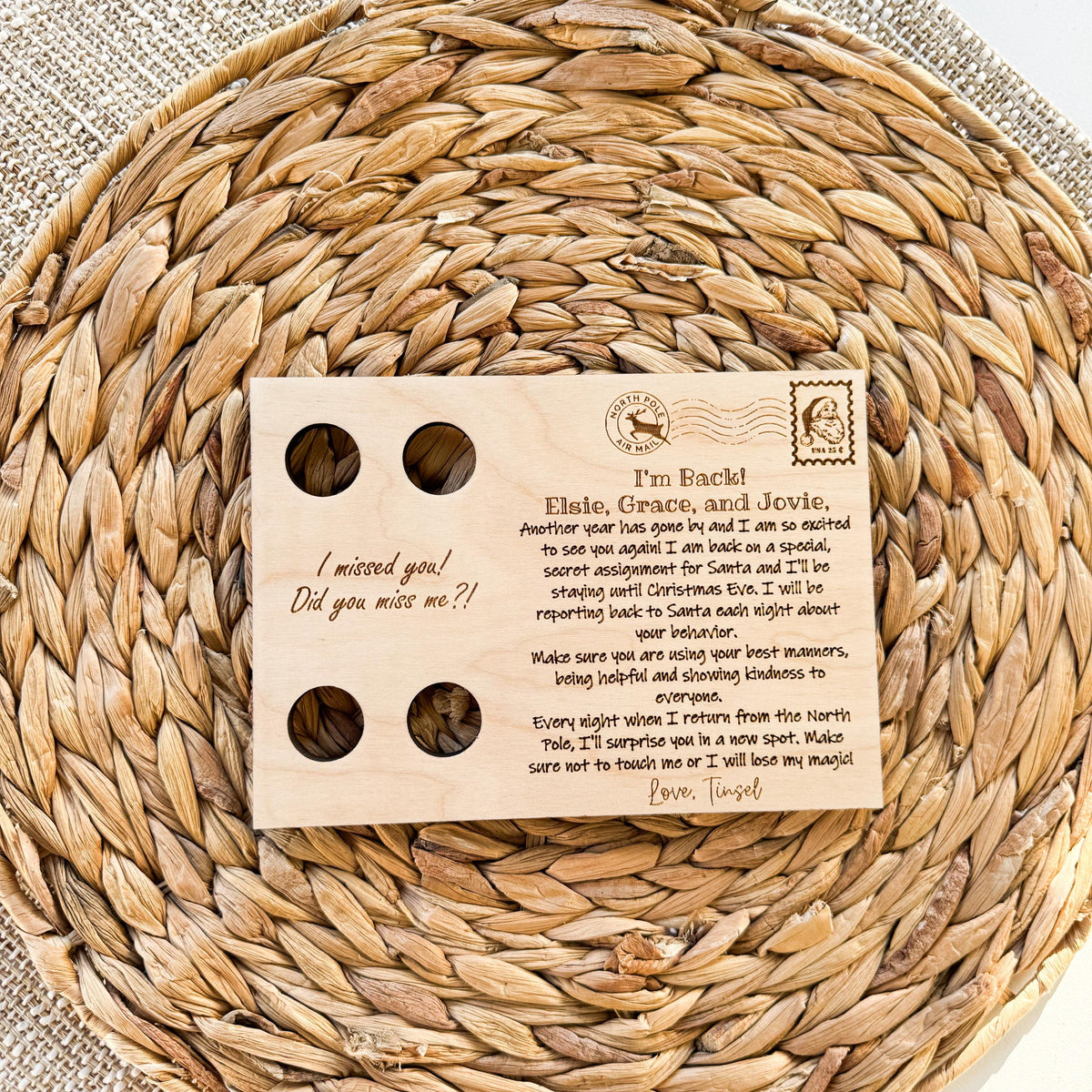 Top view of the one elf wooden postcard showing its size and cutout placement