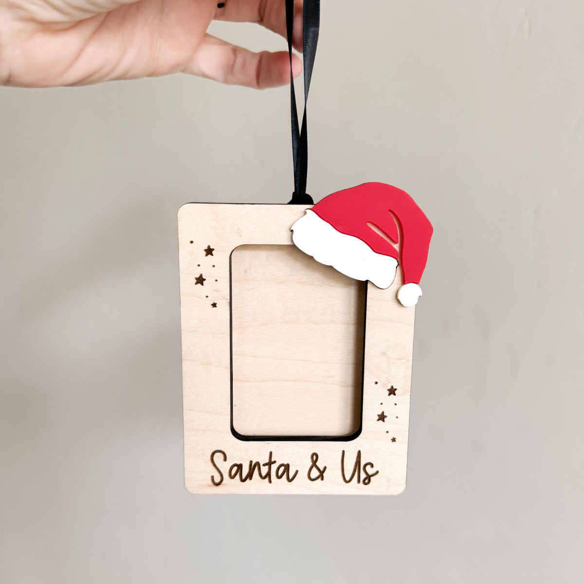 Close-up of the engraved custom message on the Santa photo frame