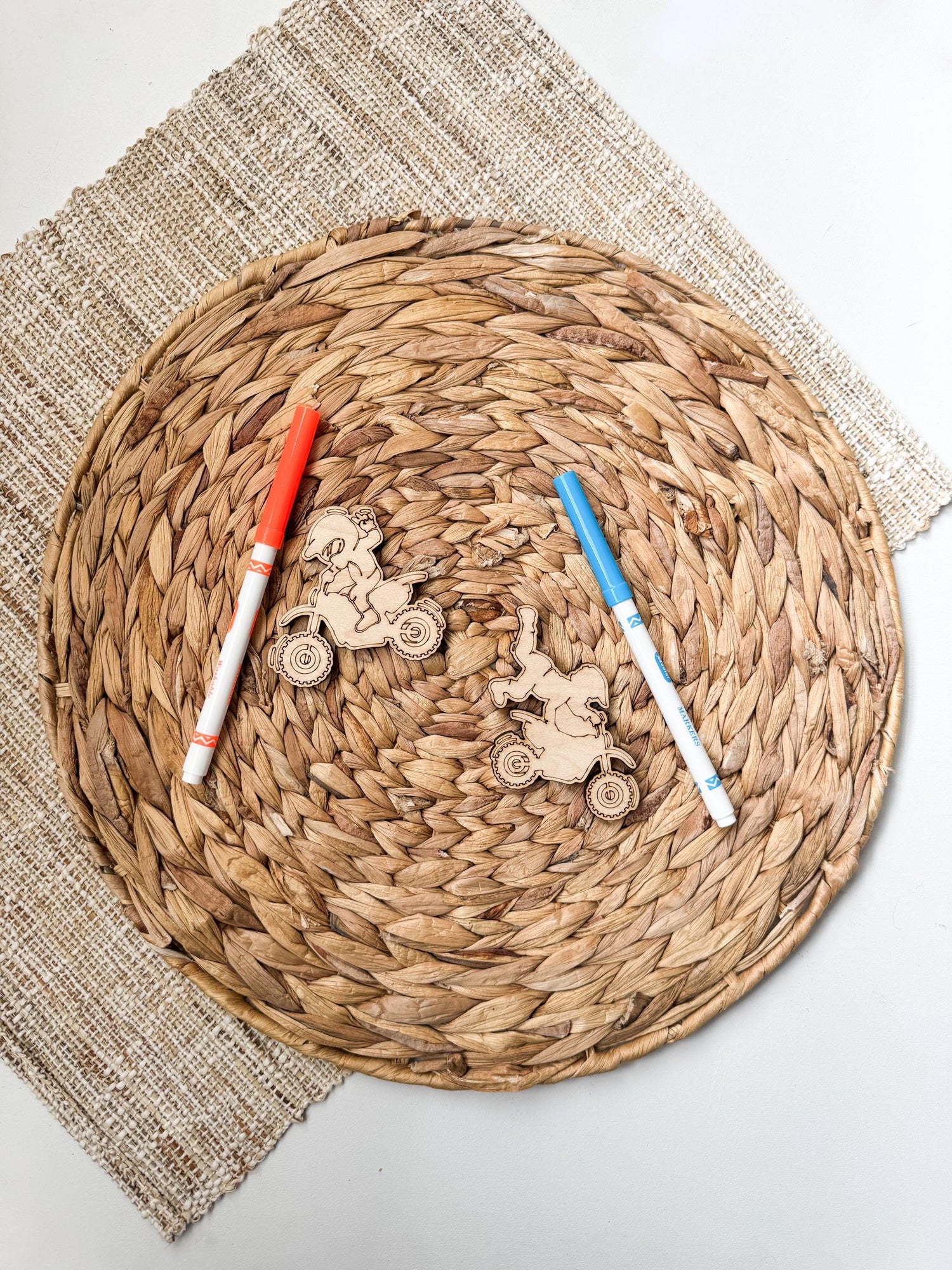 wooden dirt bike party favors, toppers and markers, ready for guests