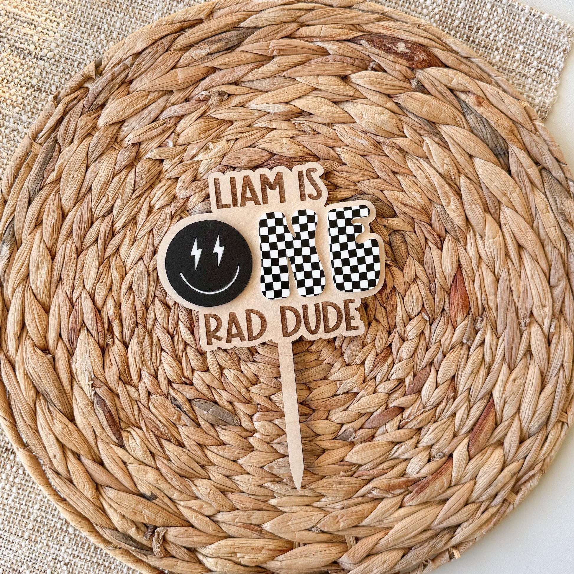 One Rad Dude checkerboard first birthday cake topper in acrylic for boys