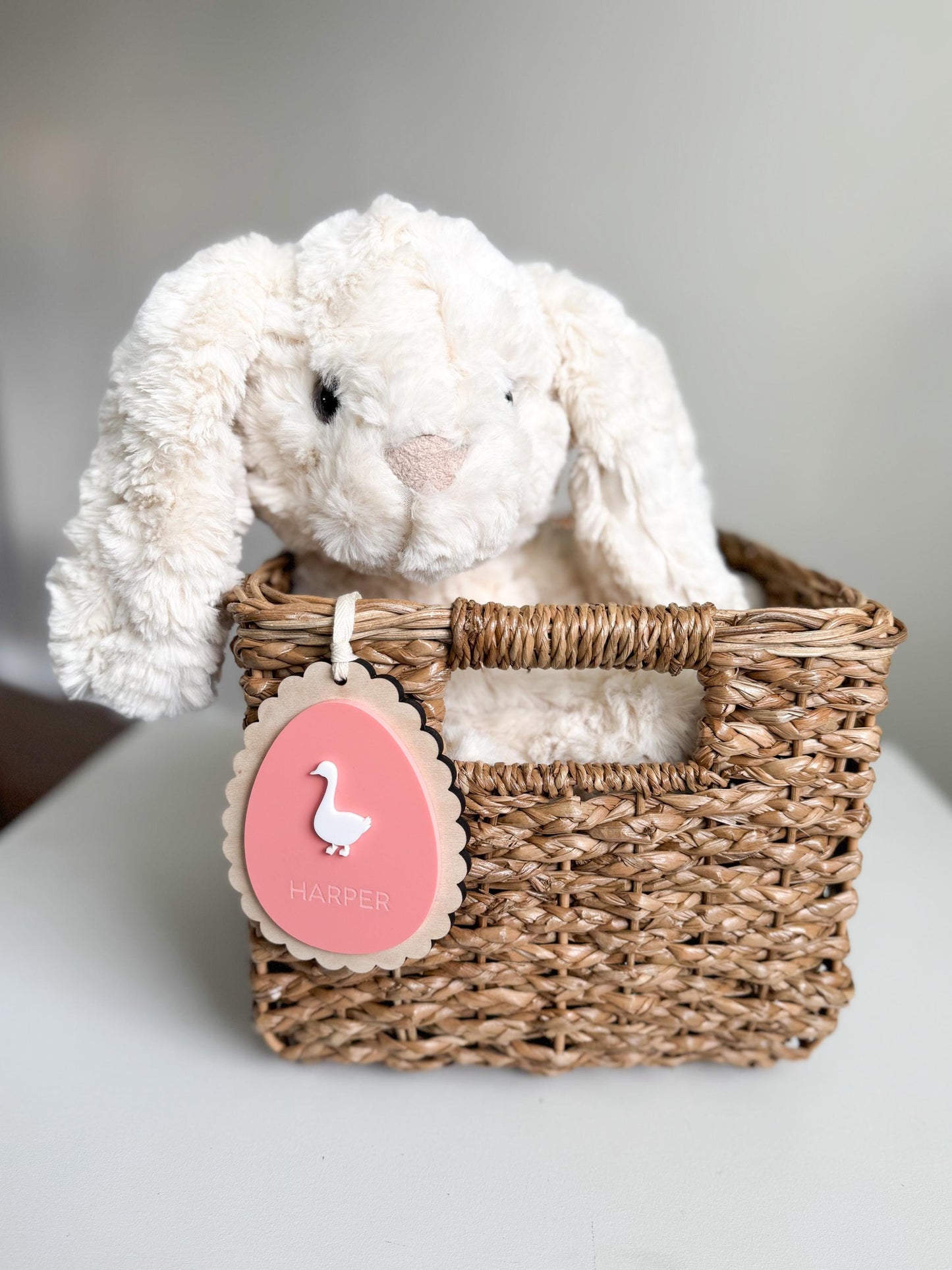Easter egg shaped basket tag in layered wood and acrylic, personalized with name
