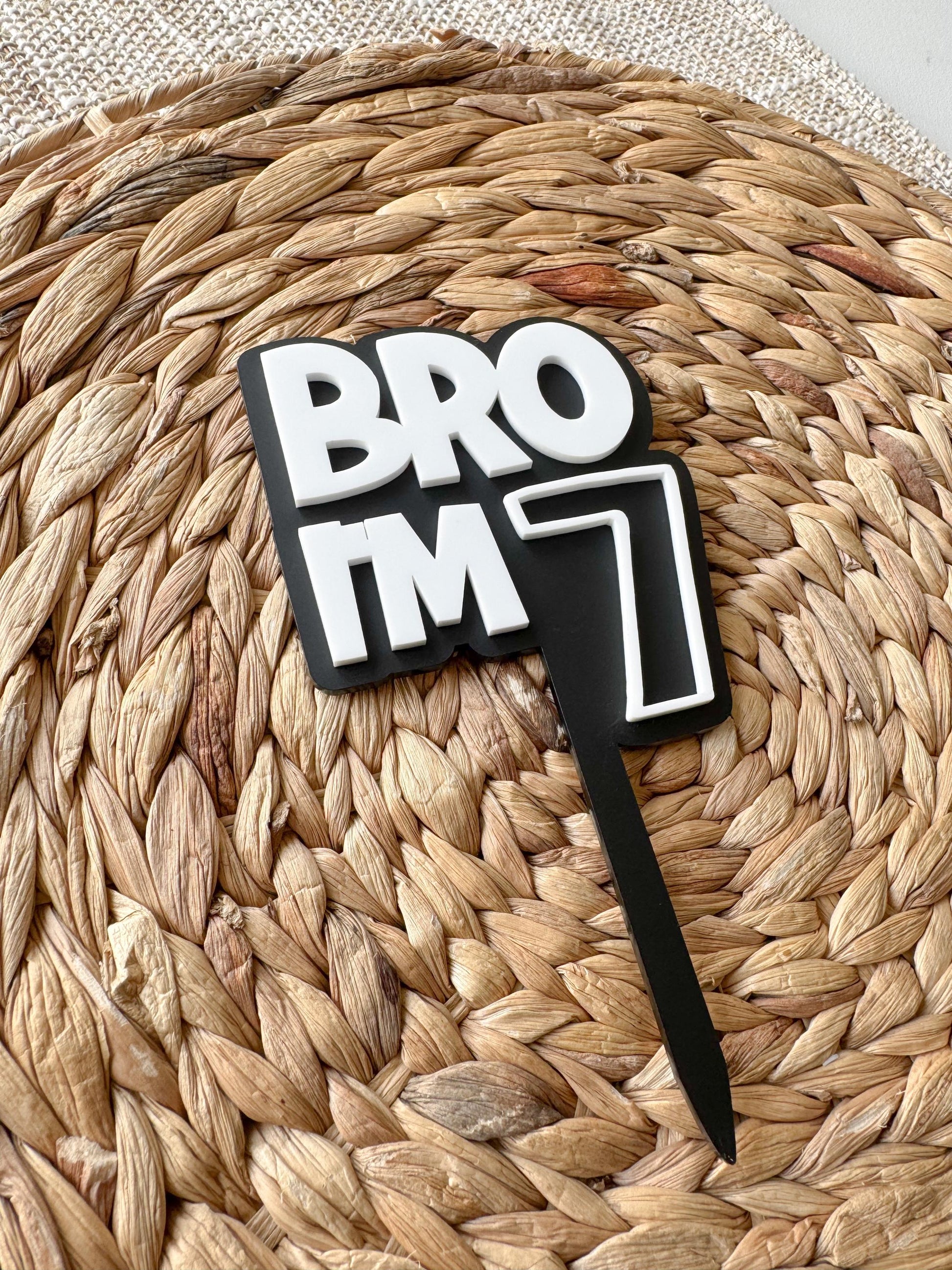 Personalized Bro I'm Age teen birthday topper showing custom age and acrylic design