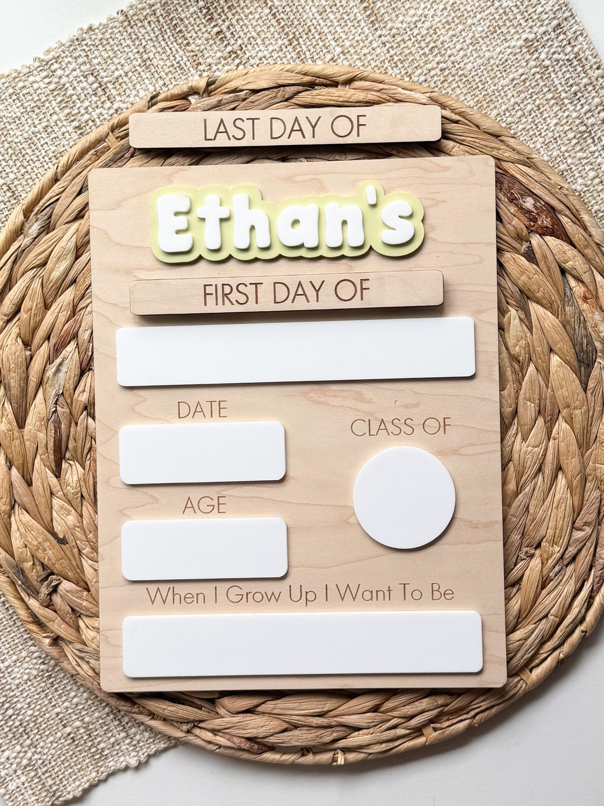 Personalized first day of school board displayed on a white background, showing the customizable dry erase sections, layered acrylic name, and natural wood finish.