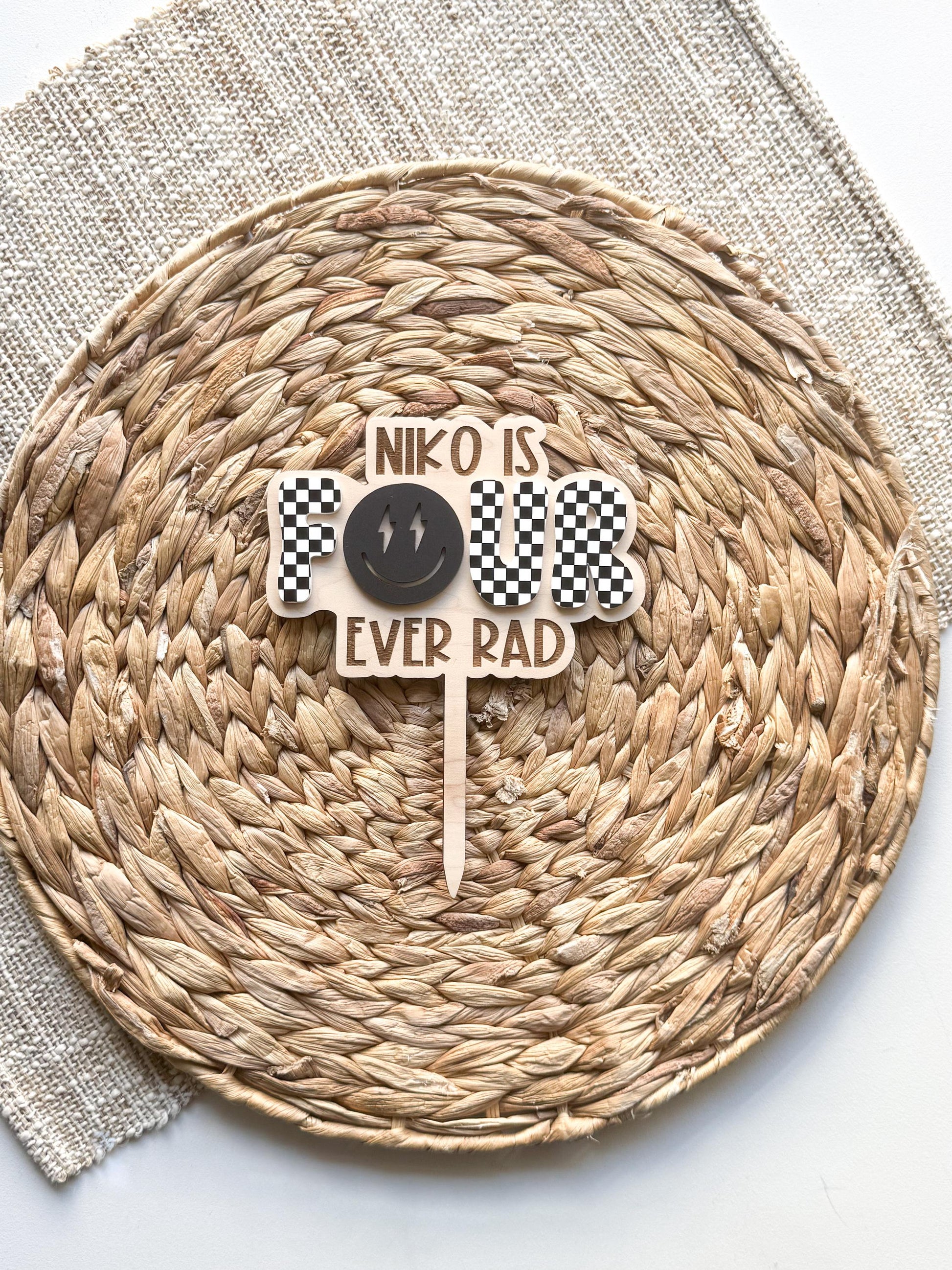 Four Ever Rad Dude checkerboard 4th birthday cake topper in acrylic, custom name