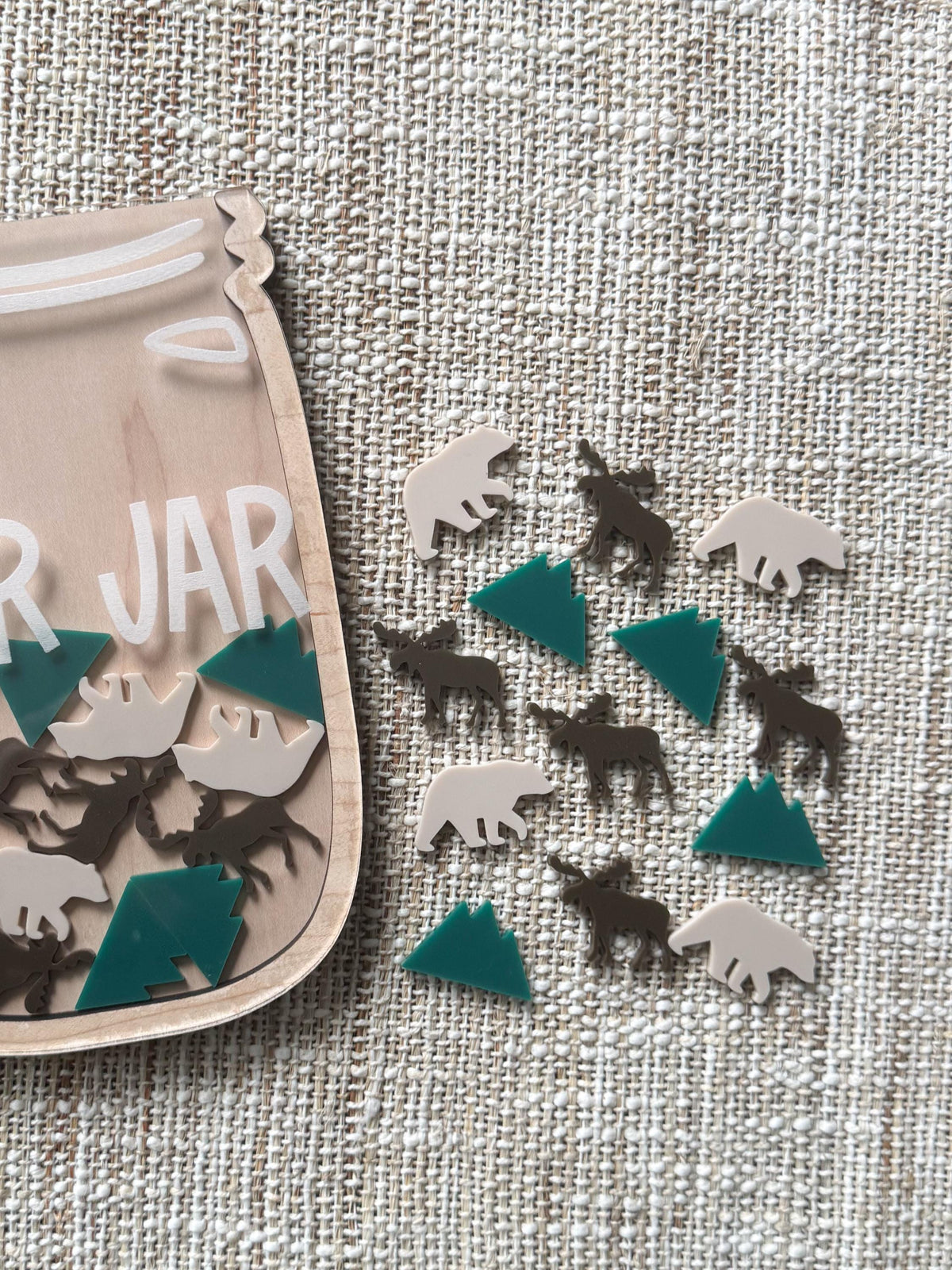 Mountain shaped acrylic reward tokens for a forest themed star jar