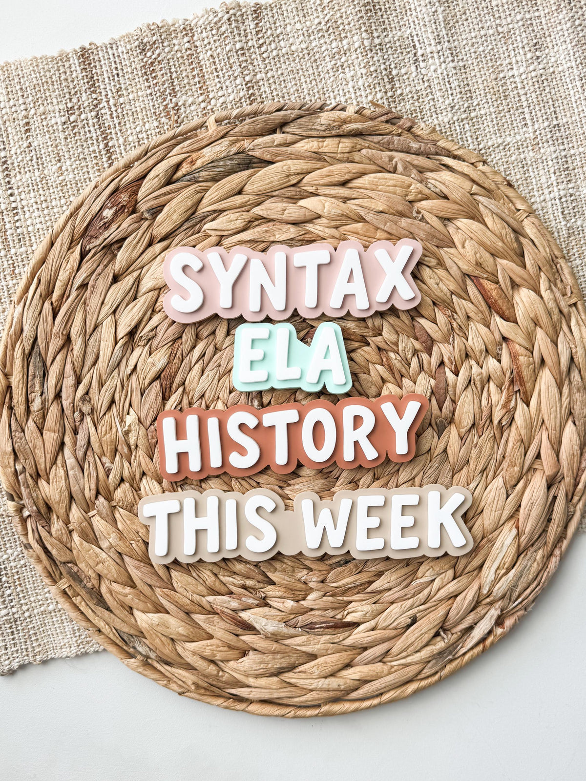 Layered acrylic teacher magnets with Syntax, ELA, History and This Week labels in pastel pink, mint and terracotta