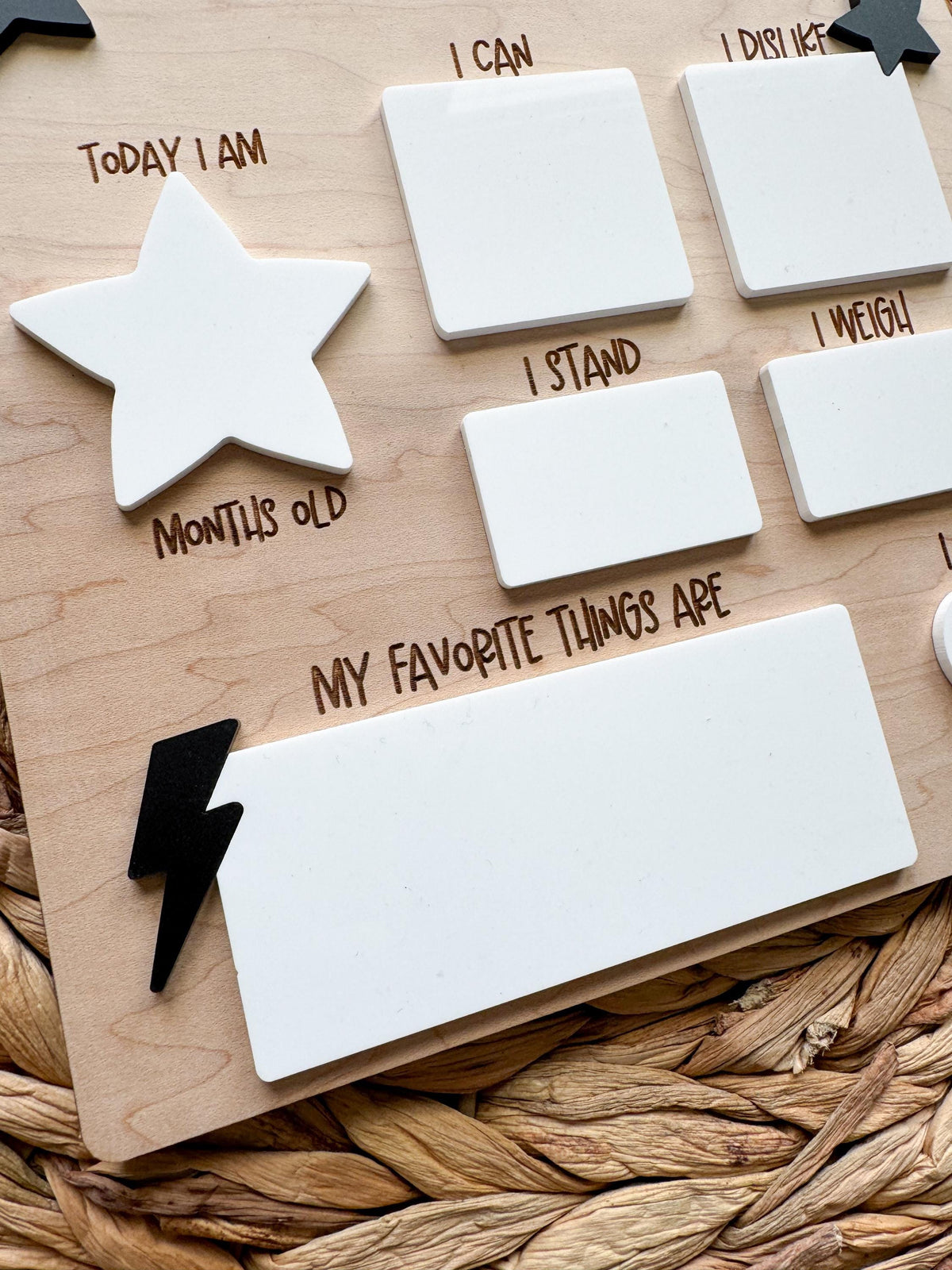 Personalized baby milestone board with star and lightning bolt accents