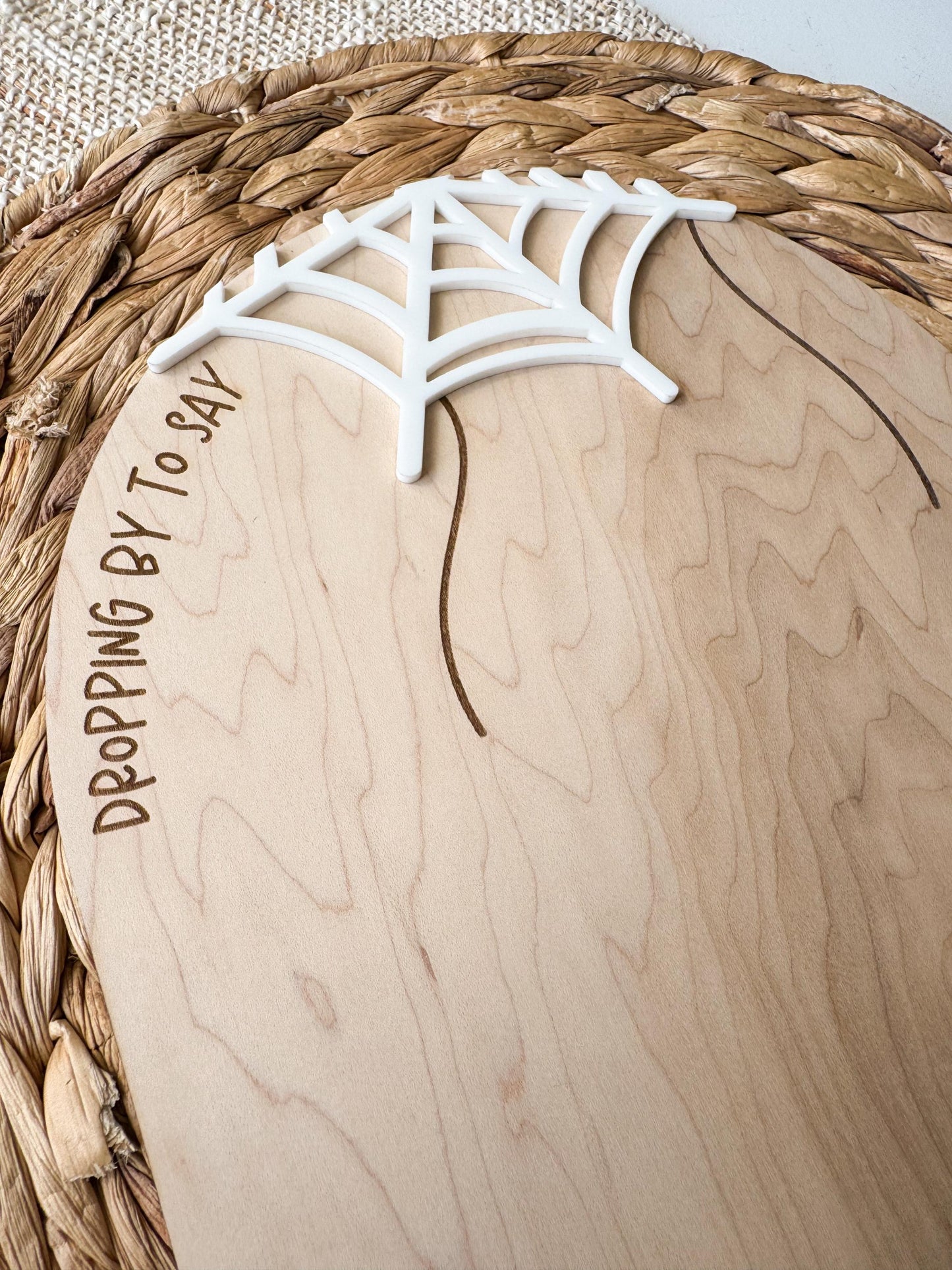 Wooden DIY Halloween footprint keepsake board showing footprint placement and custom name area