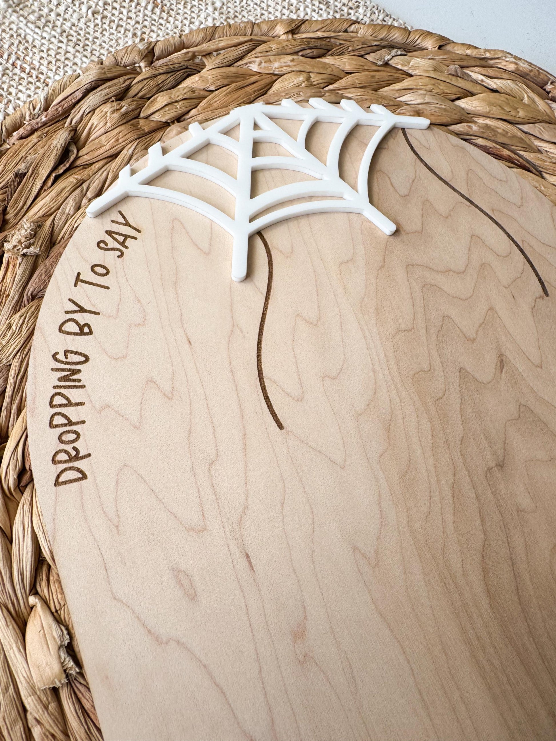 Wooden DIY Halloween footprint keepsake board showing footprint placement and custom name area