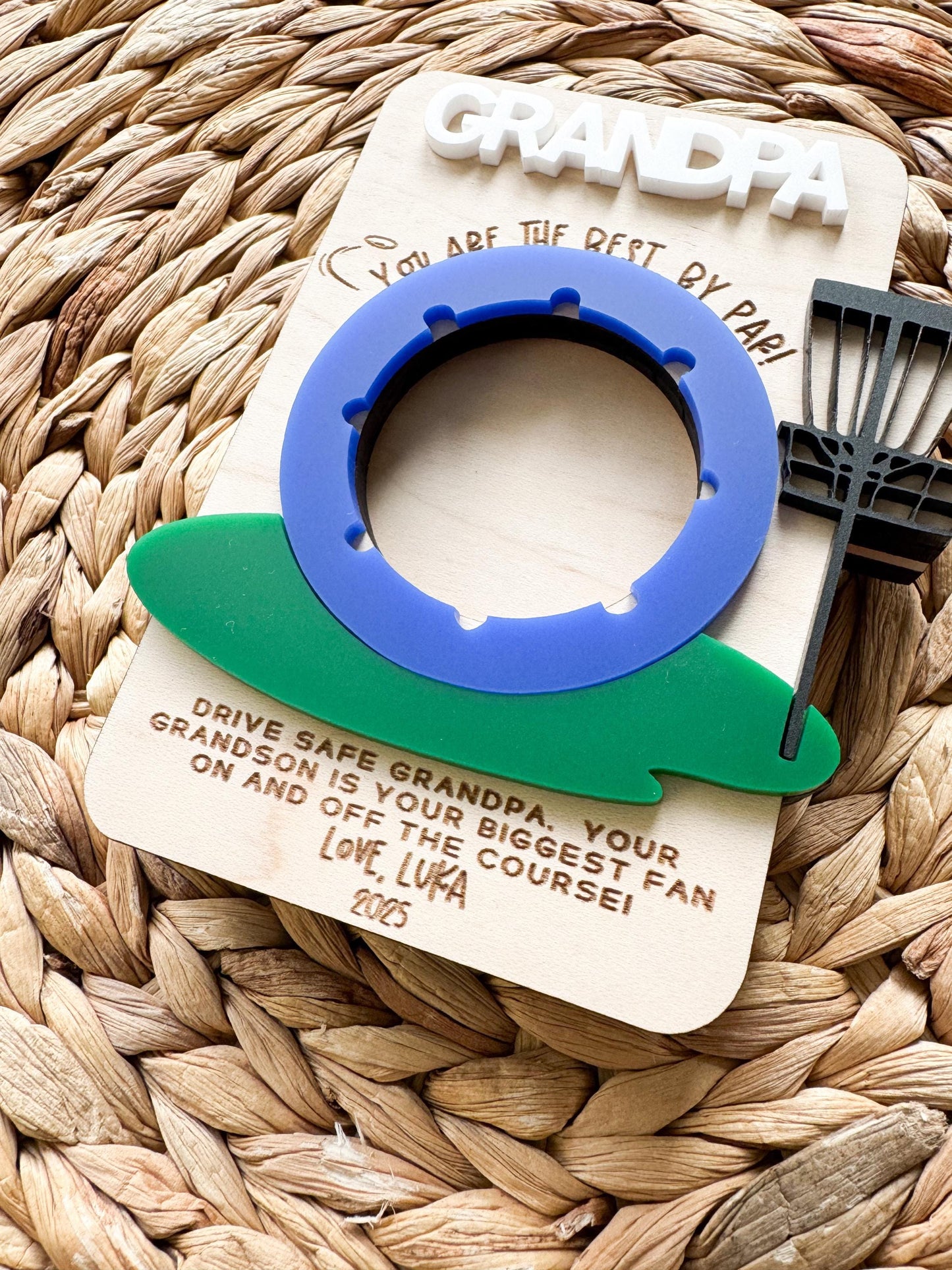 Personalized disc golf photo frame displayed as magnet or visor clip for Dad