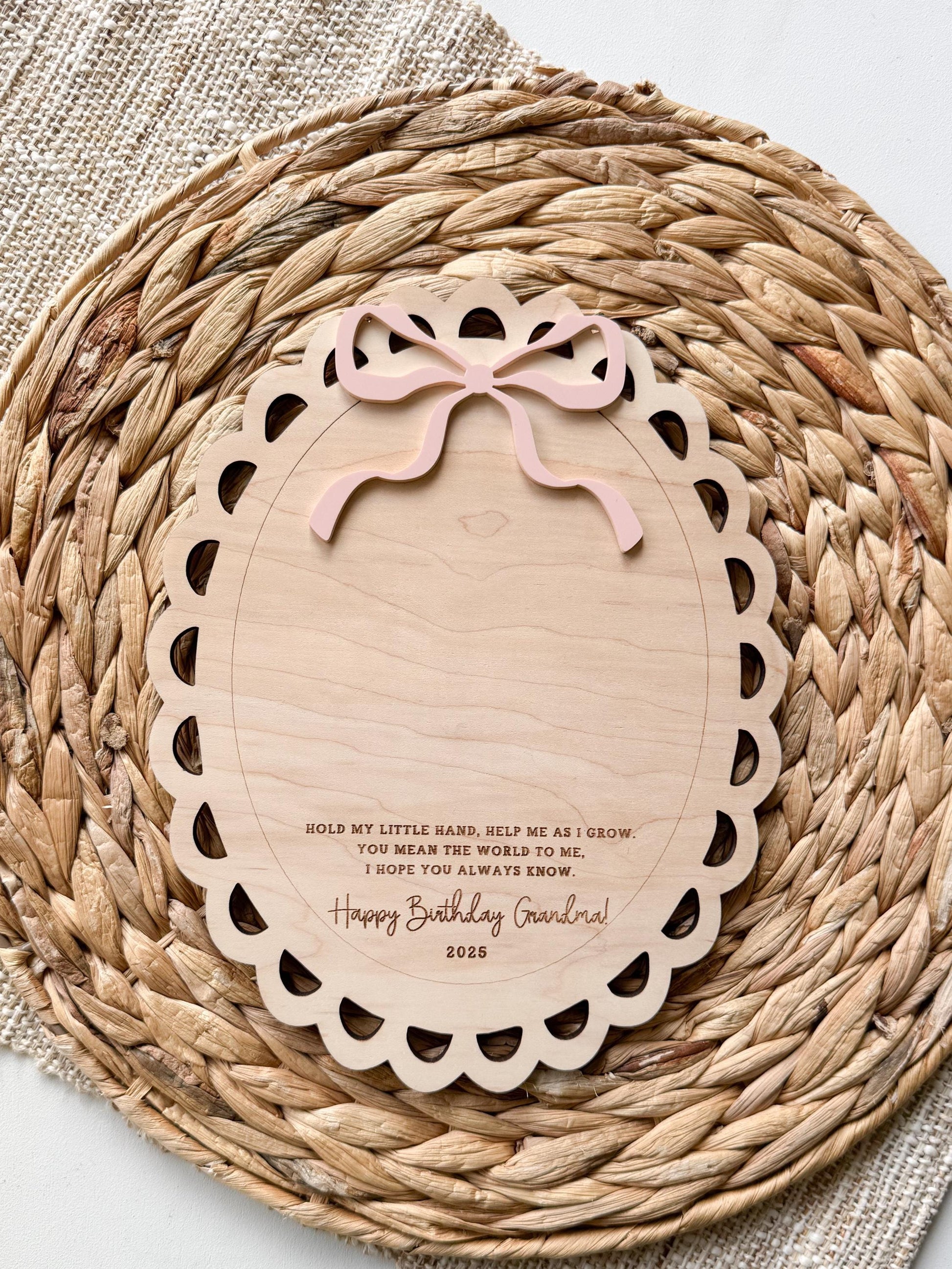 Close-up of personalized Grandma handprint plaque with custom name and handprint detail