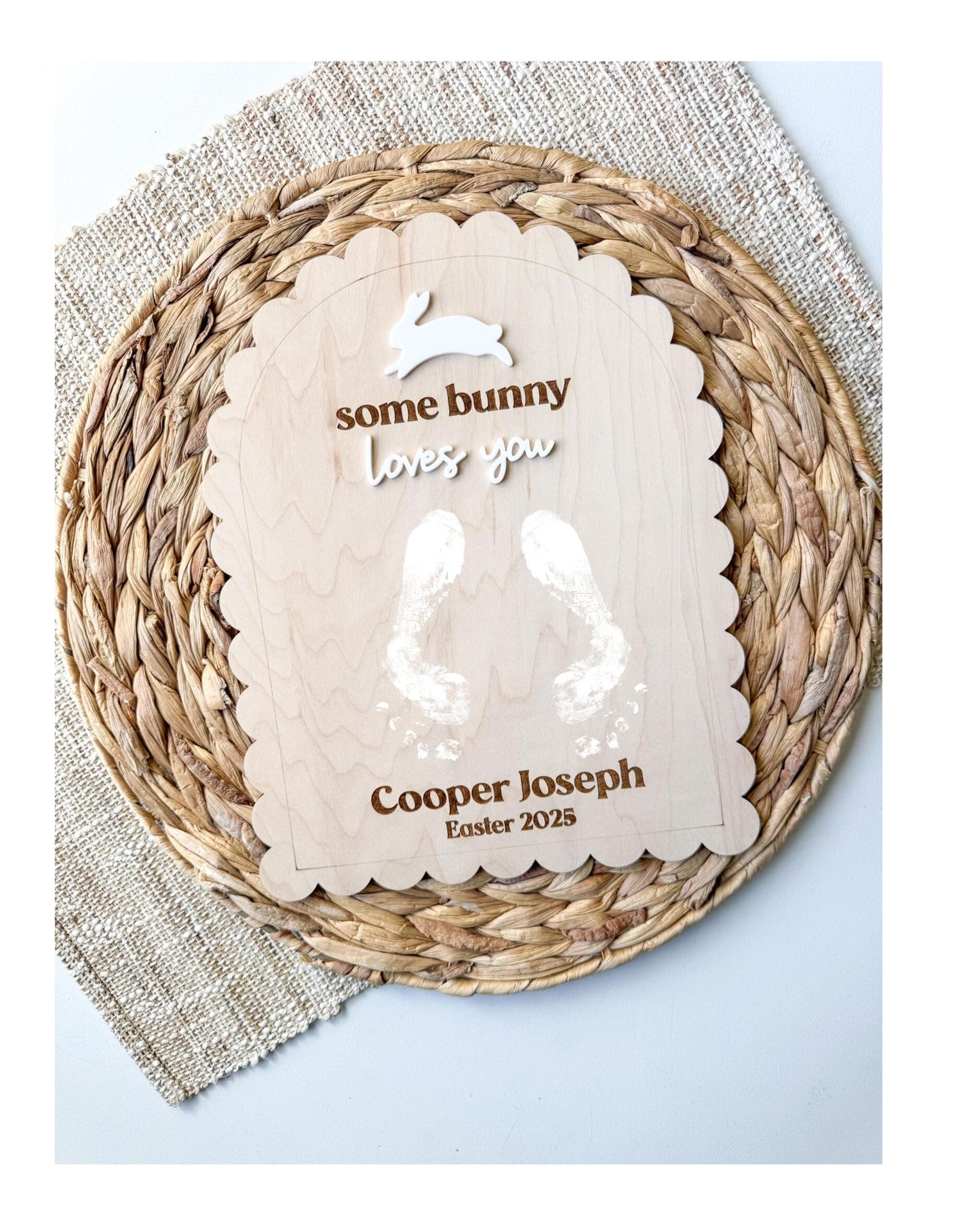 Personalized Easter handprint keepsake sign saying Some Bunny Loves You on maple wood