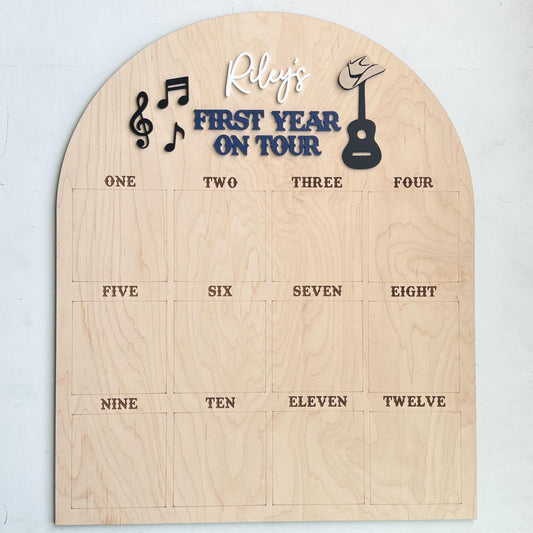 First Year On Tour music theme photo board in maple wood, first birthday monthly milestone display