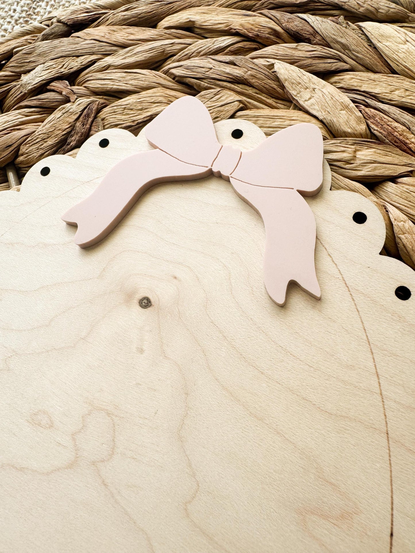 Scalloped maple wood sign with acrylic bow accent designed for kids handprint keepsake