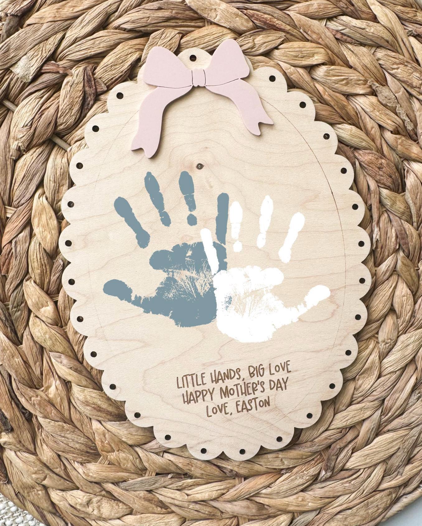 Personalized mothers day handprint keepsake sign made from maple wood with acrylic bow accent