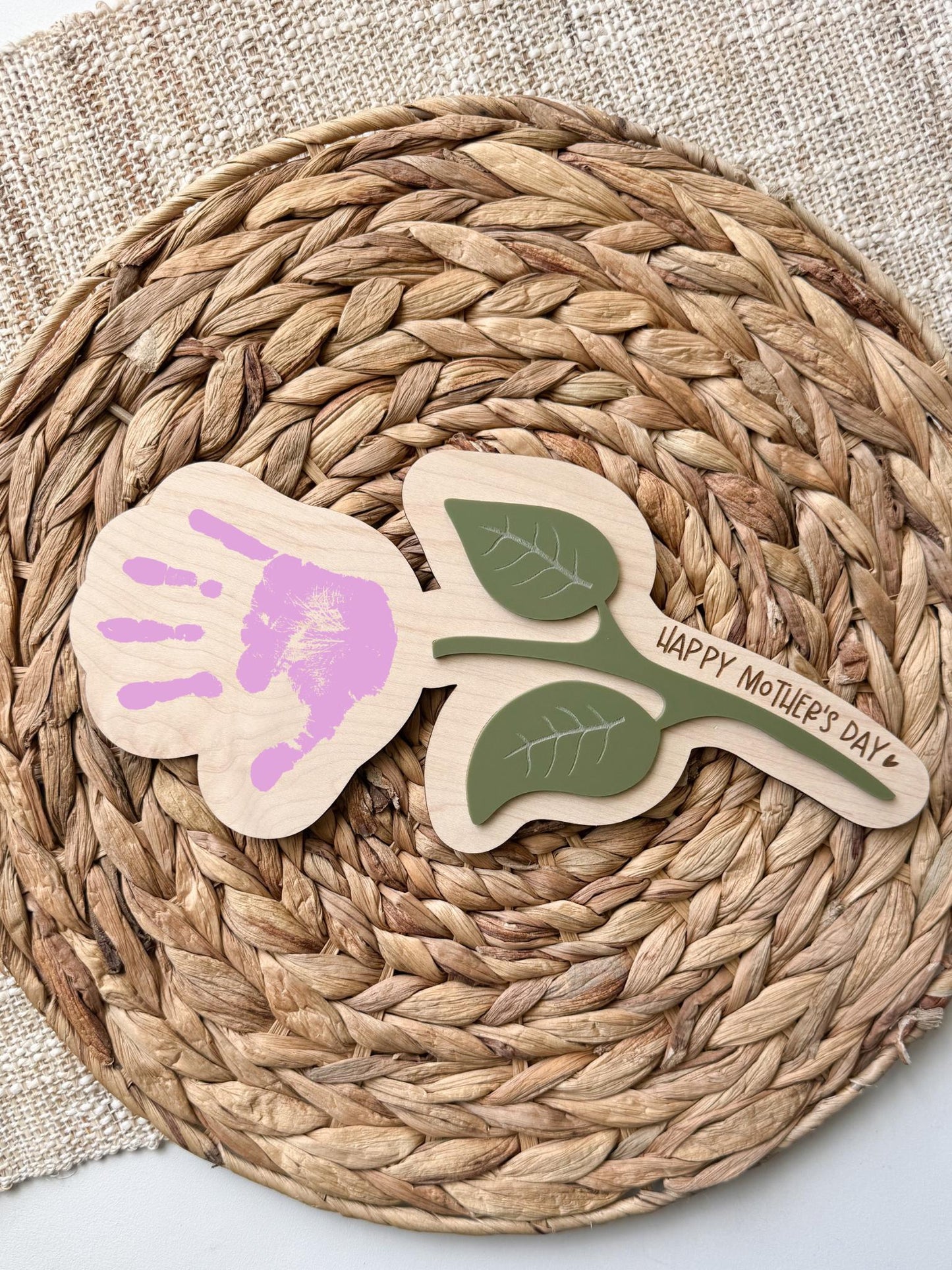 Wooden flower handprint craft keepsake showing child handprint painted as flower bloom