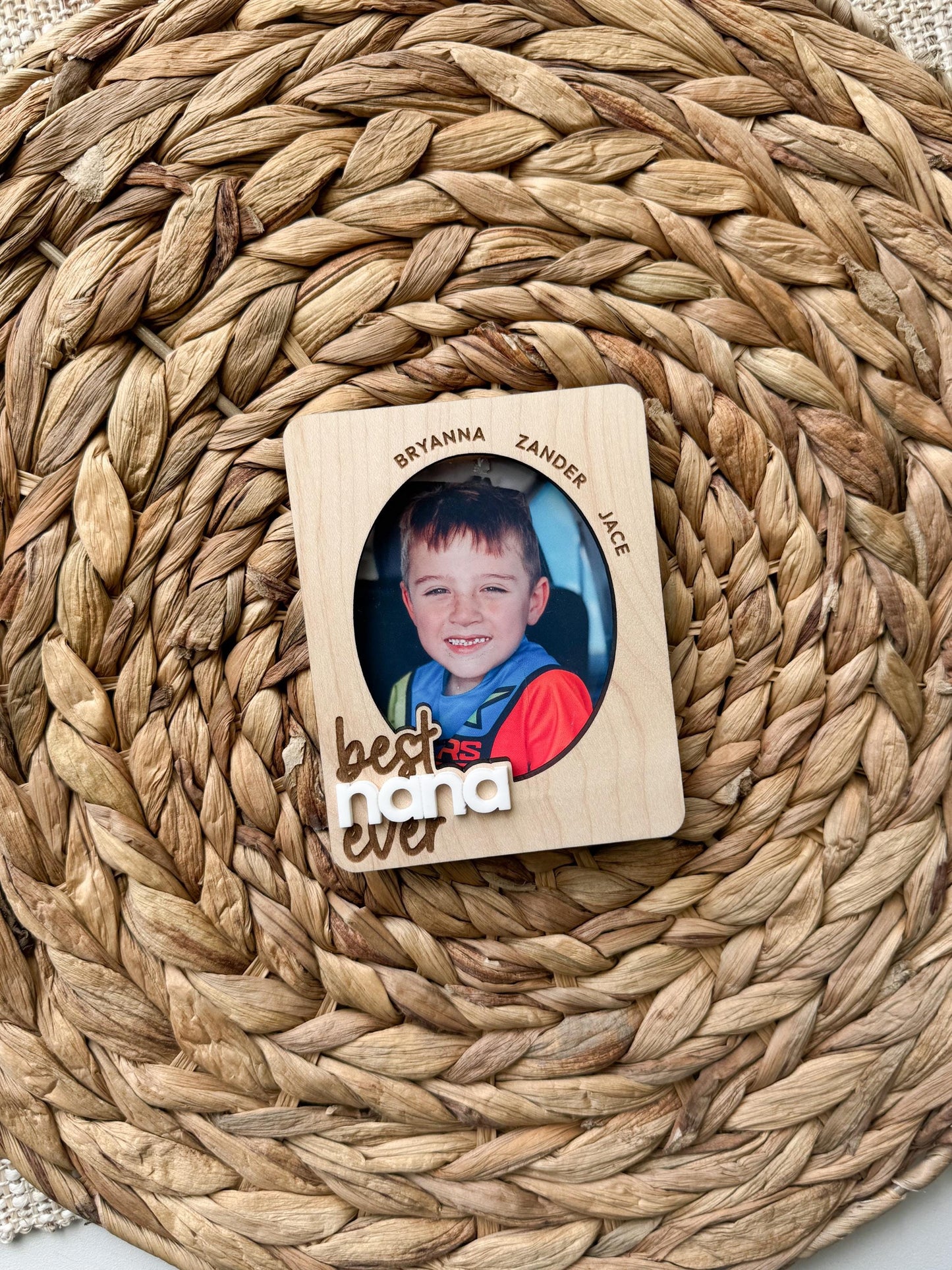 Personalized photo visor clip displayed as car accessory gift for nana or grandma