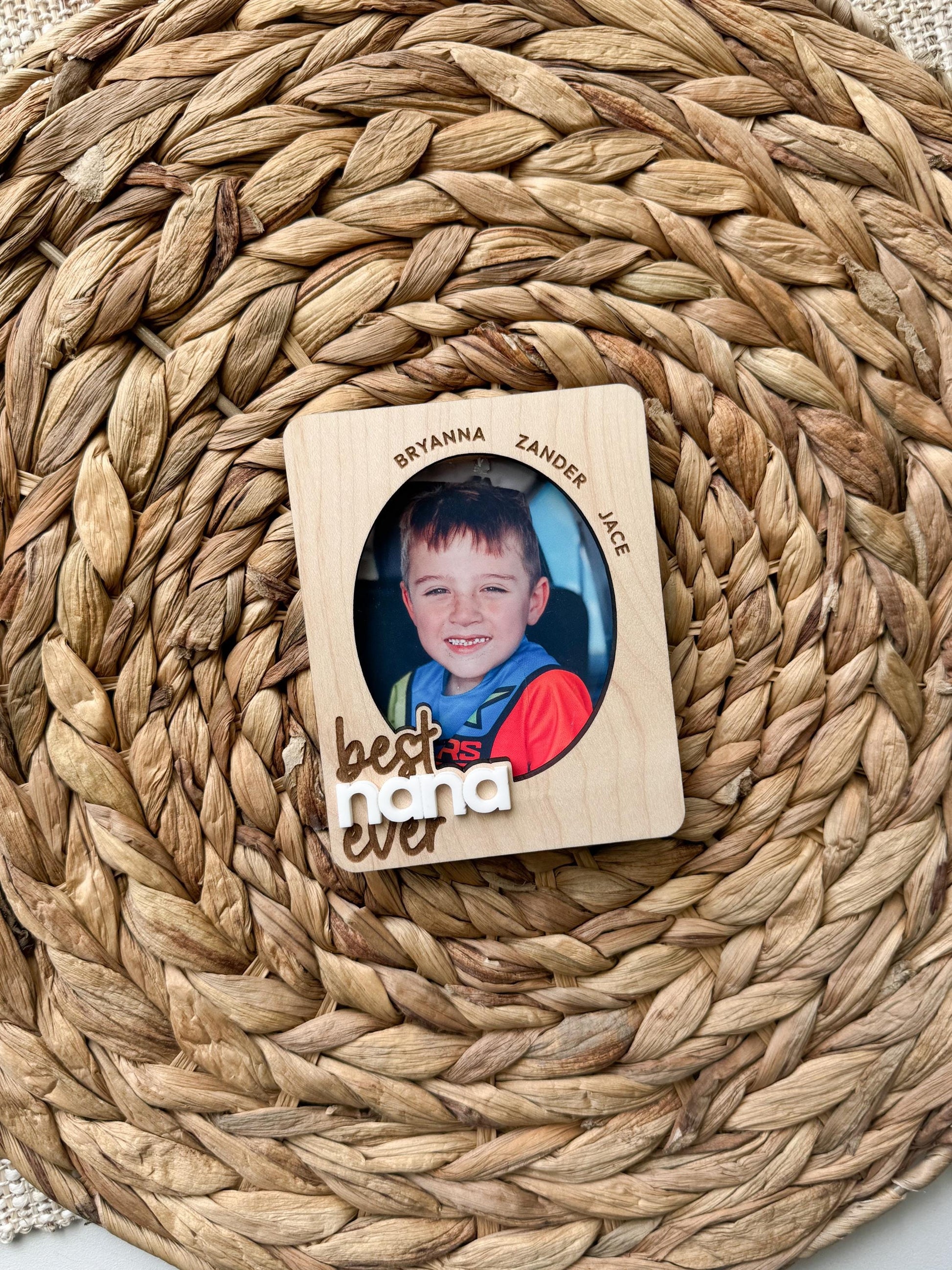 Personalized photo visor clip displayed as car accessory gift for nana or grandma