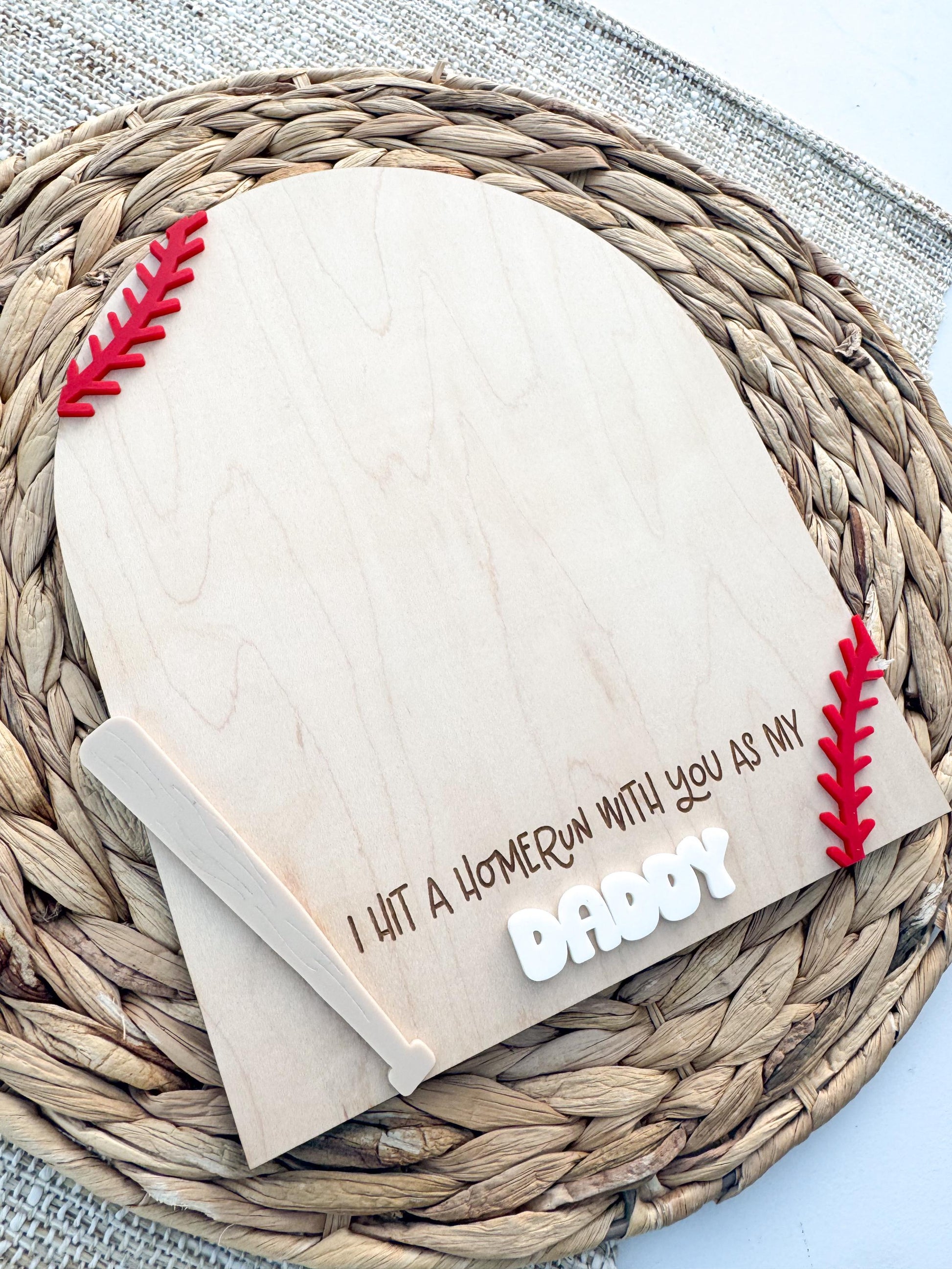 Close-up of baseball handprint sign for Dad showing personalized name and baseball design