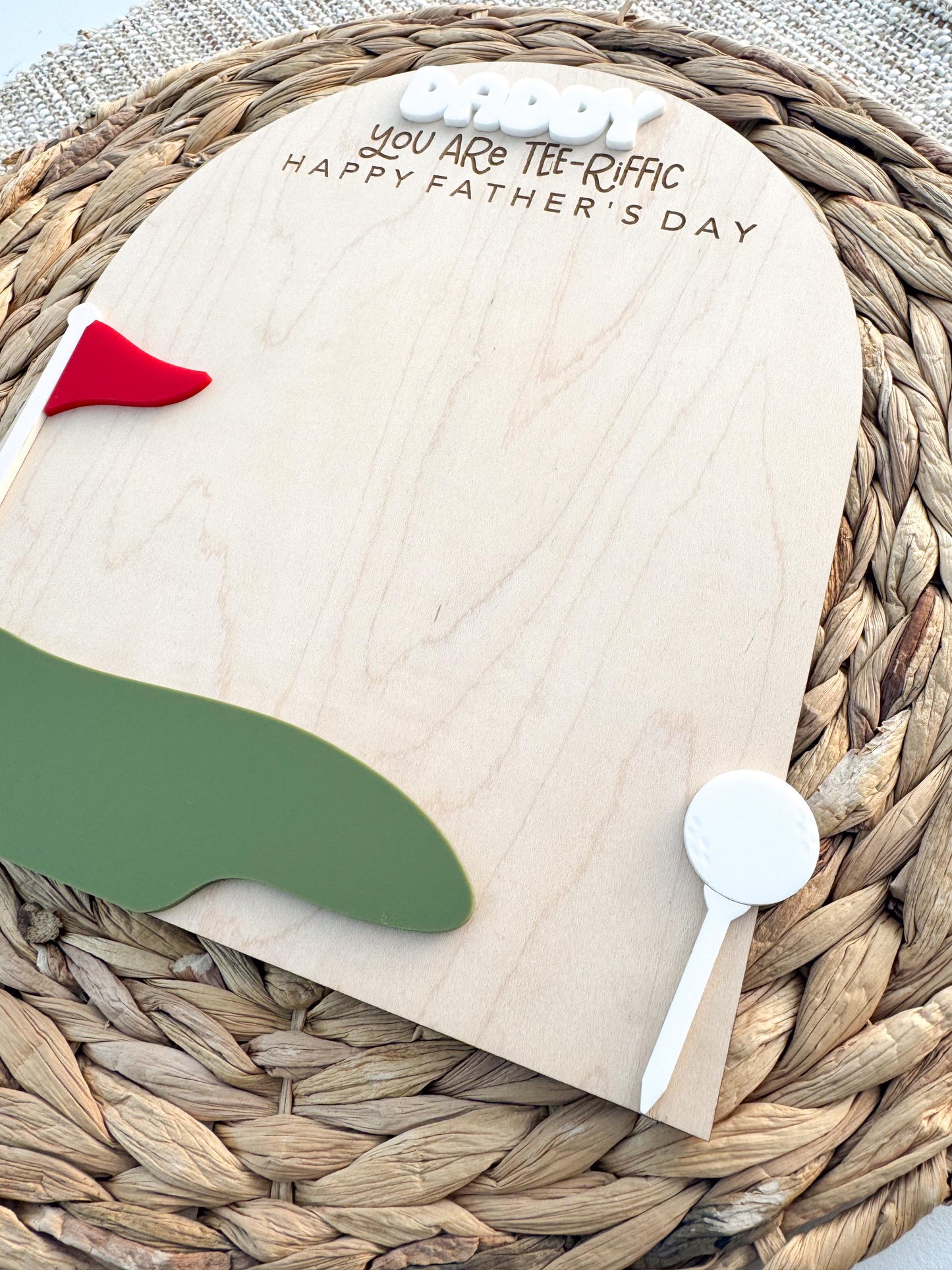 Golf-themed daddy handprint sign with acrylic golf tee and green course detail
