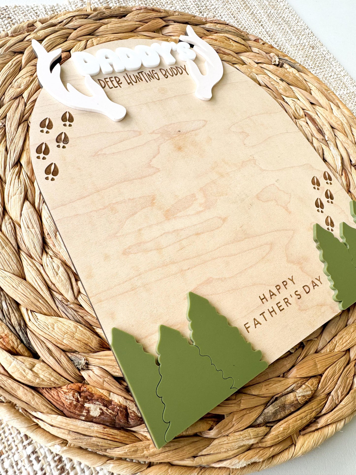 Maple wood hunting handprint keepsake displayed on woven neutral background