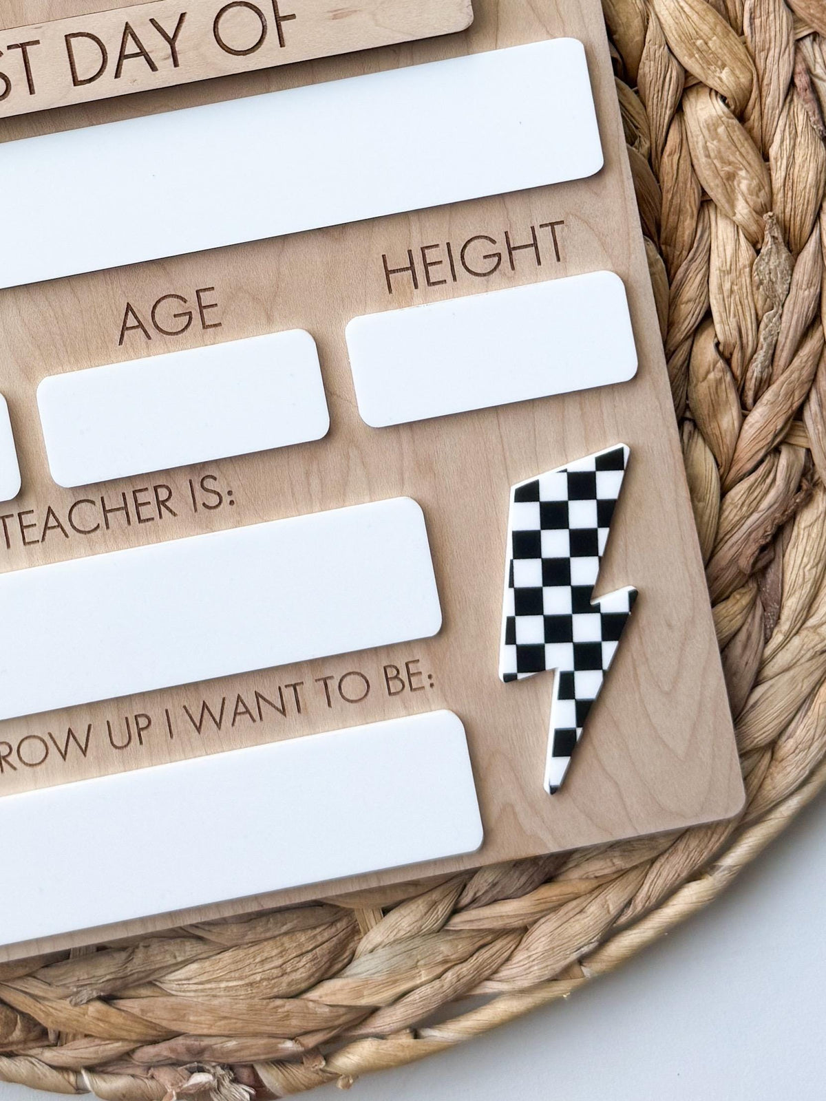 checkerboard lightning bolt back to school sign with dry erase fields for age, height, teacher and goals, maple wood