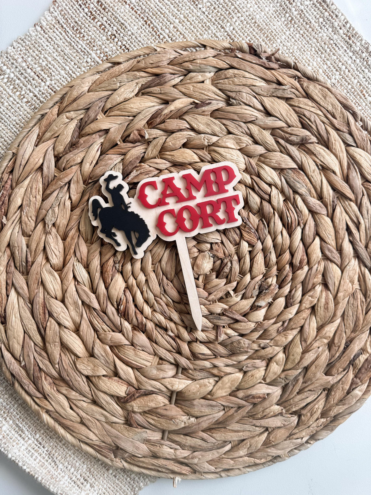 Rodeo acrylic cake topper with bronc rider silhouette and custom wording