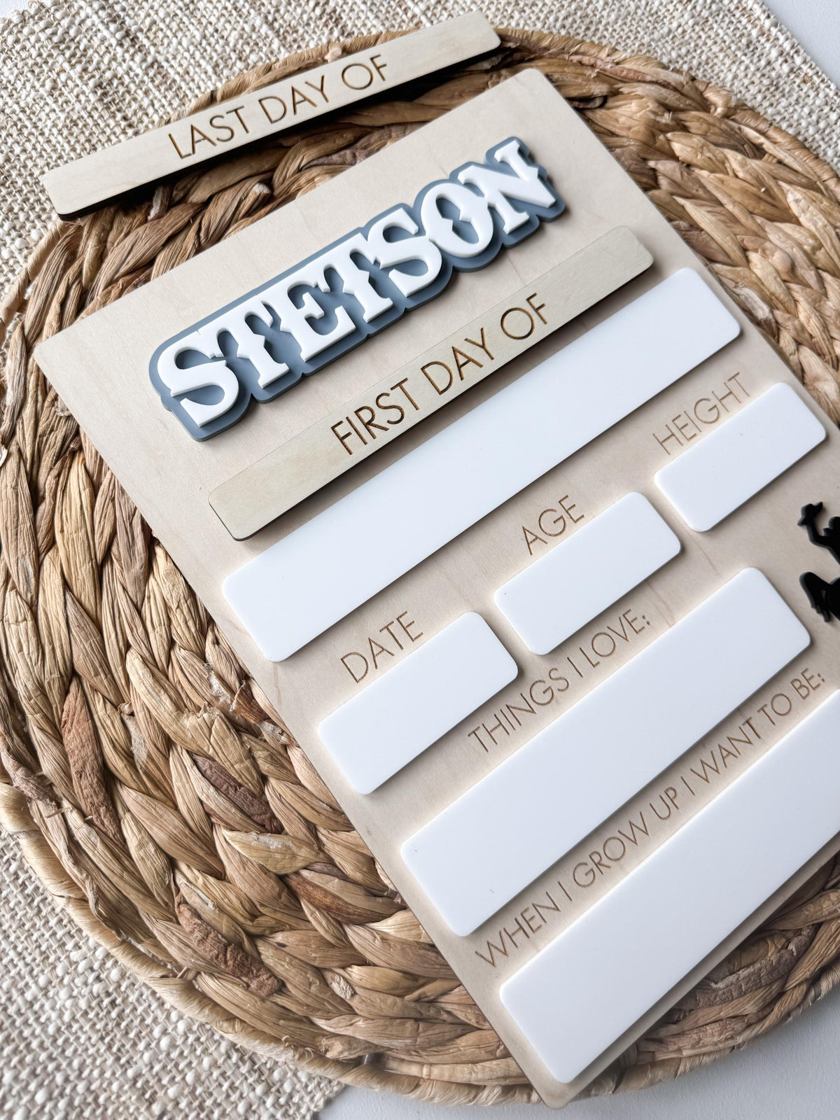 Personalized first day school board featuring layered acrylic name and reusable dry erase sections for yearly photos.