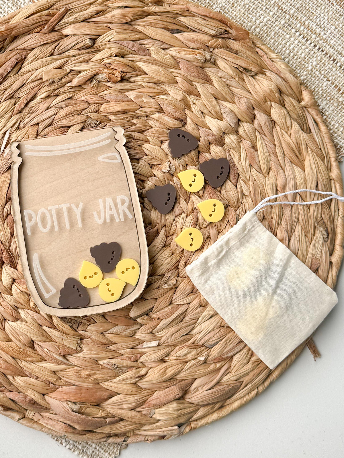 Wooden potty reward jar with acrylic pee and poop tokens and drawstring token bag, a toddler potty training gift