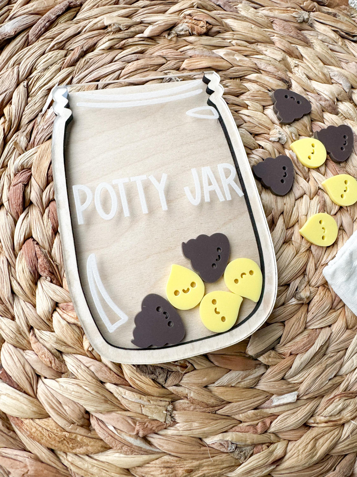 Angled view of a personalized potty jar for toddlers, a fun sticker chart alternative for potty training