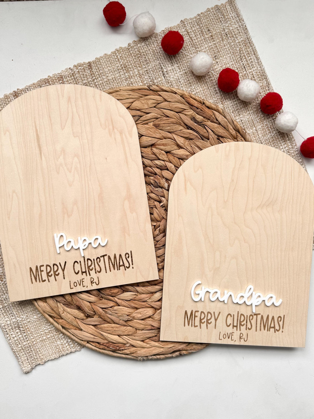Two blank maple handprint signs for Papa and Grandpa with raised acrylic names