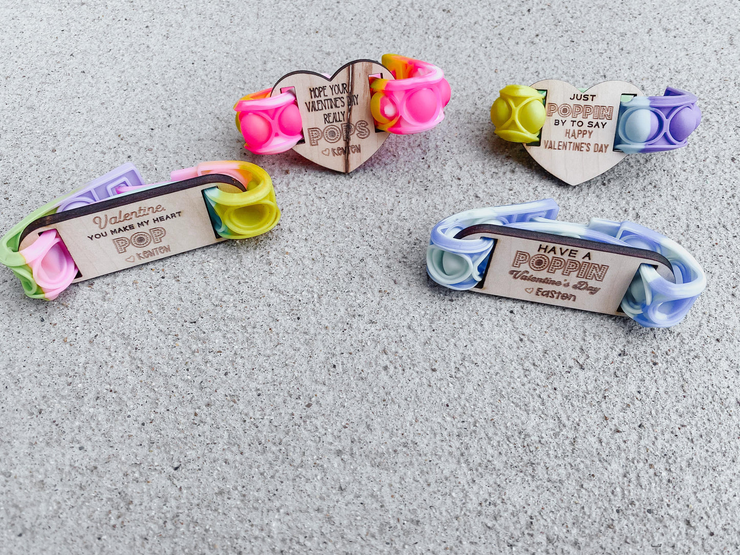 Pop it bracelet Valentine cards displayed for kids classroom party